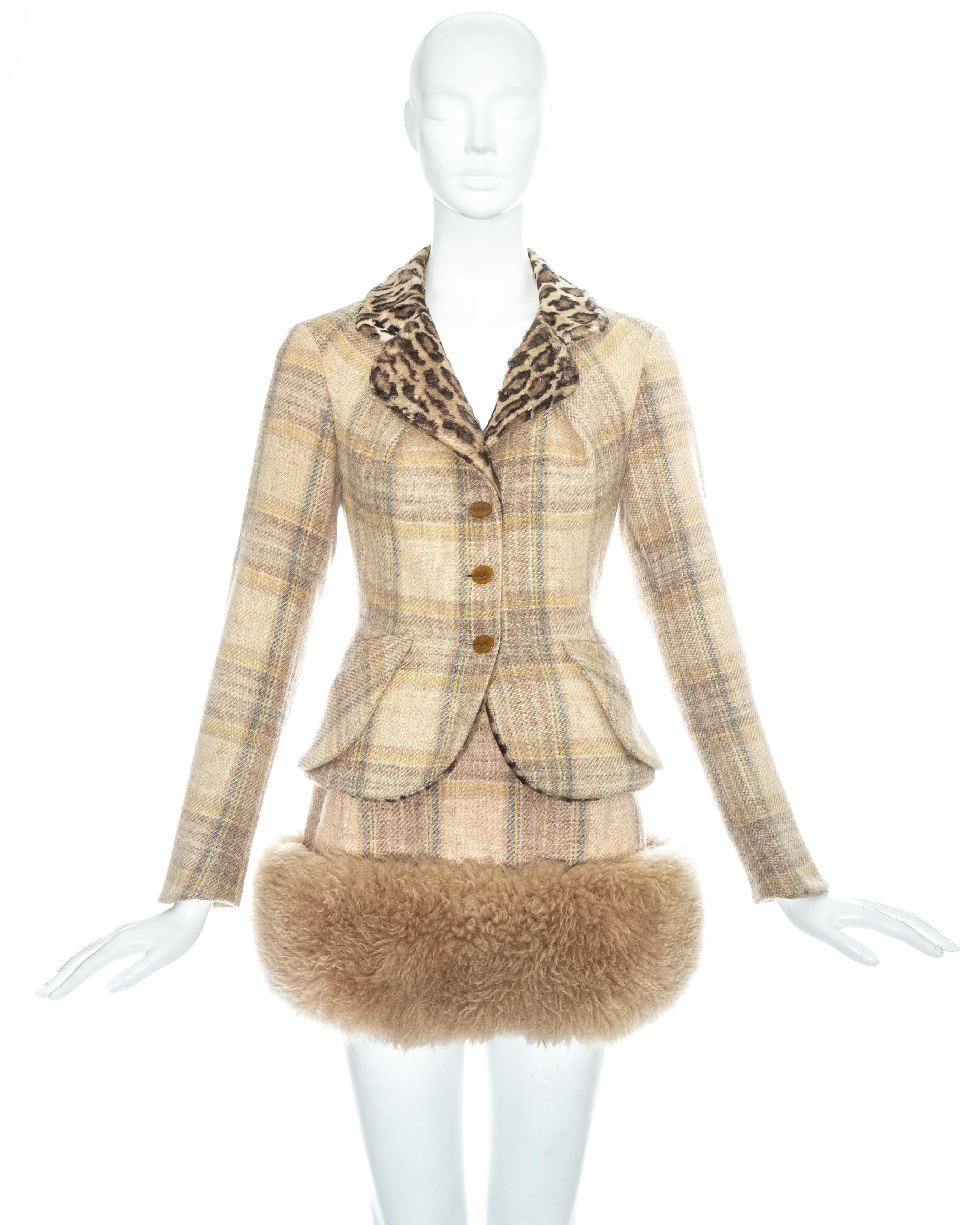 Vivienne Westwood; oatmeal tartan wool skirt suit. 

- Blazer jacket with leopard print faux fur collar, three 'Orb' button fastenings and pocket flap peplum
- Micro mini skirt with large cream shearling trim, zip and button fastening. 

Fall-Winter