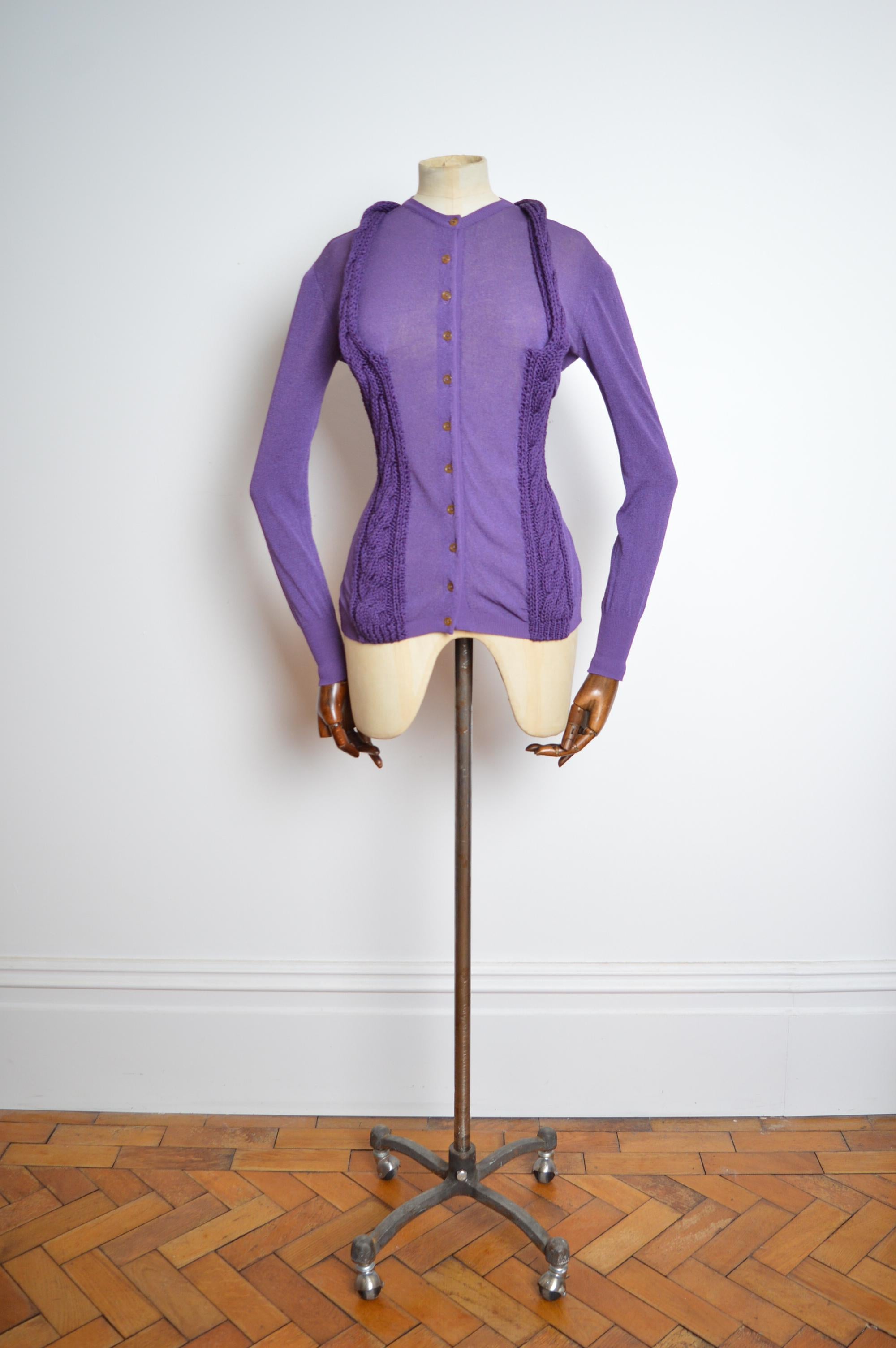 Vivienne Westwood Unusual Purple Knit Halter Neck Cardigan 
MADE IN ITALY
Purple Blue Berry colour / Buttons down the front / long sleeves 
Pit to Pit; 19”
Pit to Cuff; 19”
Nape to Hem; 26”
Size; Large (UK 12-14) 
Condition; 7/10 Good Condition