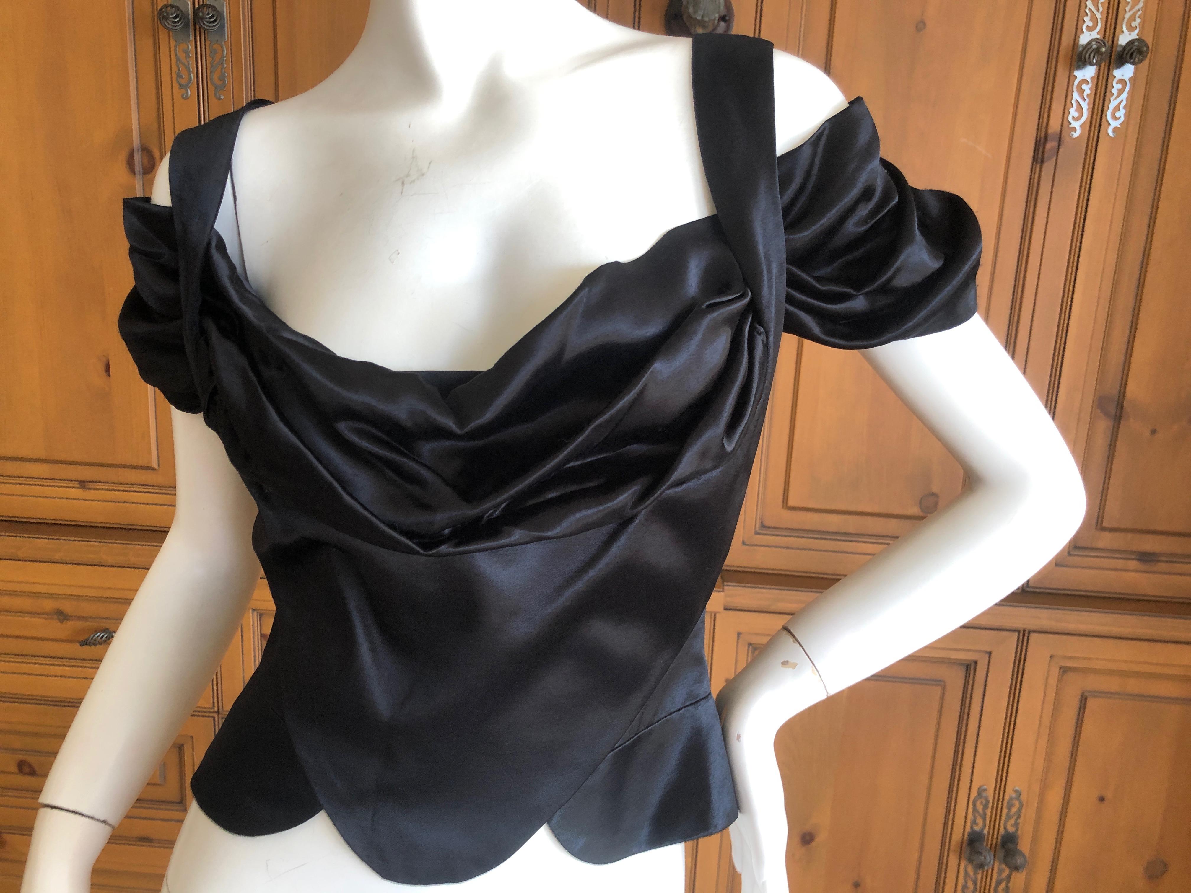 Vivienne Westwood Vintage Red Label Black Satin Drape Front Corset Top.
SO pretty
Size 42 UK
There is a lot of stretch in this fabric.
Bust 36