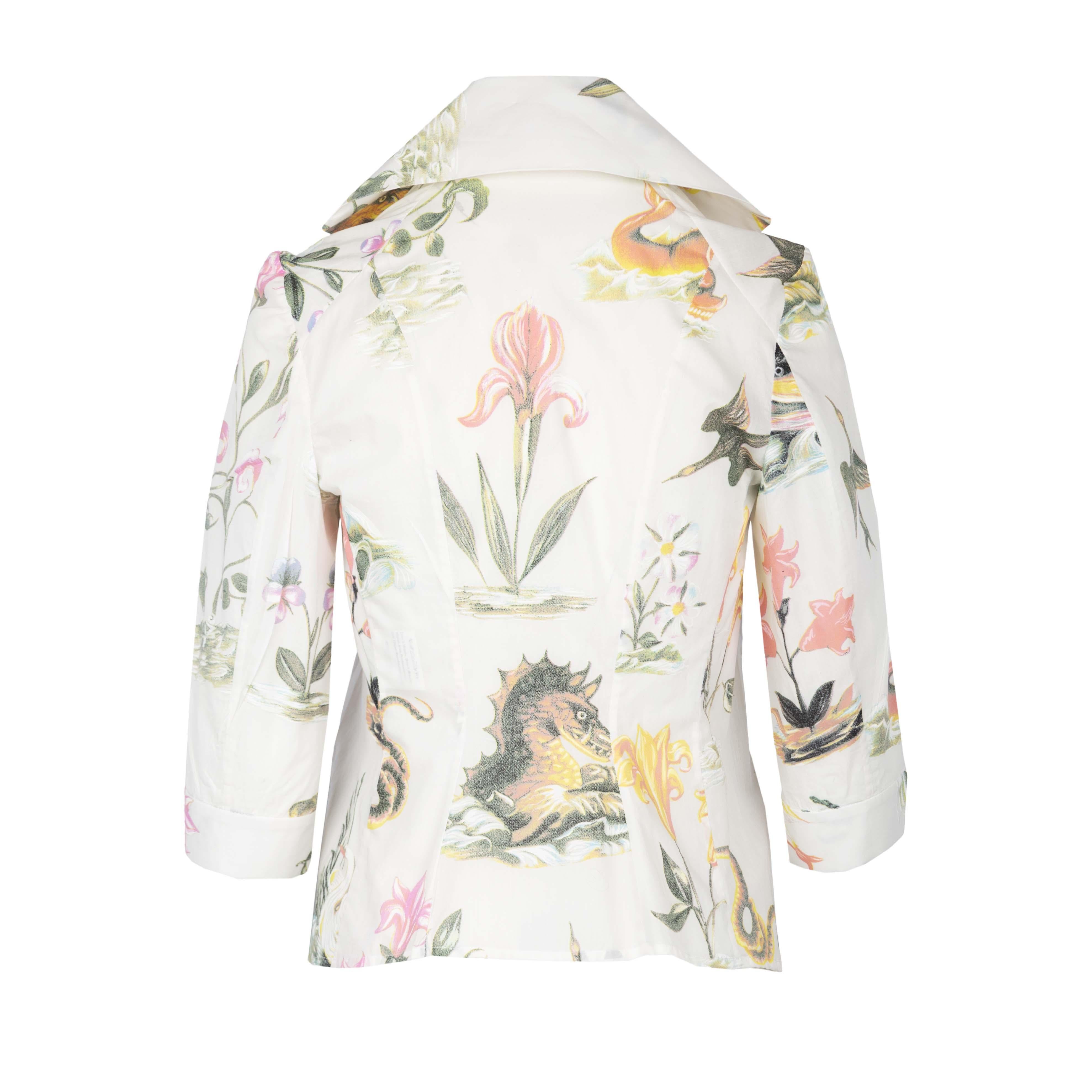 A rare and vintage Vivienne Westwood cotton shirt in sea monster prints from 1997. The three-quarter sleeved shirt features a wide collar, a pocket on the front and orange-golden buttons.

Shoulder - 39 cm
Sleeve - 43 cm
Bust - 40.5 cm
Length - 69