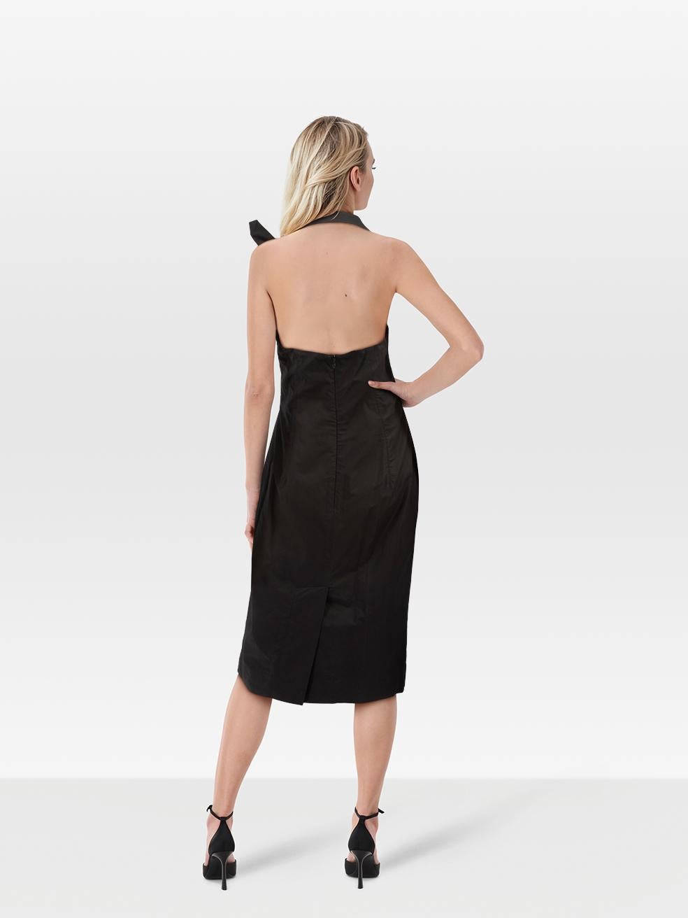 CONDITION is Very good. Minimal wear to the dress is evident. Scratching tot he zipper pull on the centre back zip. Pen marks on the composition label. Loose hook for the centre back closure on this used Vivienne Westwood designer resale item.
 
 
