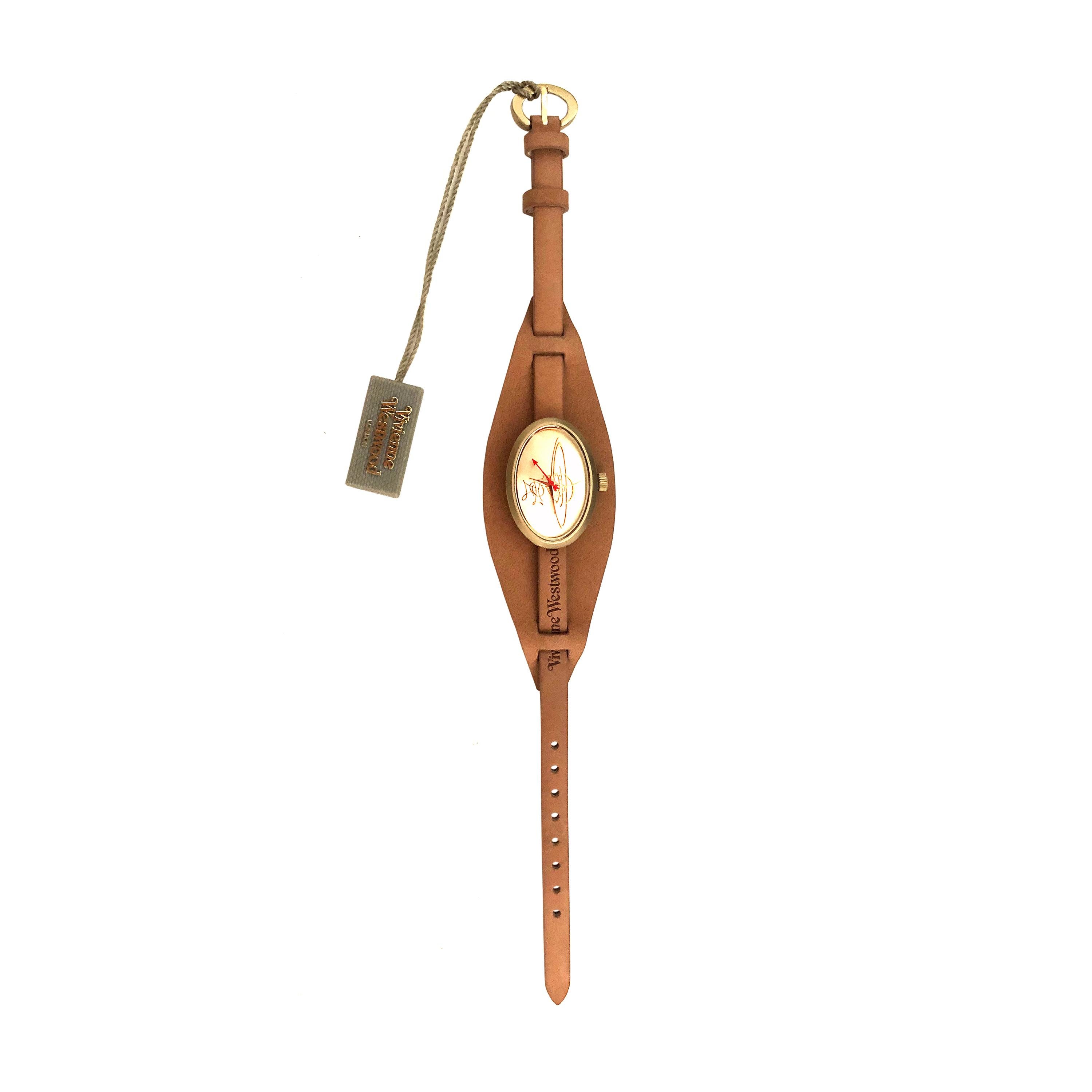 Produkt Details: Vivienne Westwood Uhr - Modell Nr VV056GDBR - Satin Gold Oval 'Orb' Zifferblatt  - Branded 'Vivienne Westwood' Satin Gold Dornschließe - Tan Lederarmband + 'Vivienne Westwood' Branding - Quarzwerk - Analog - Satin Gold Zifferblatt +
