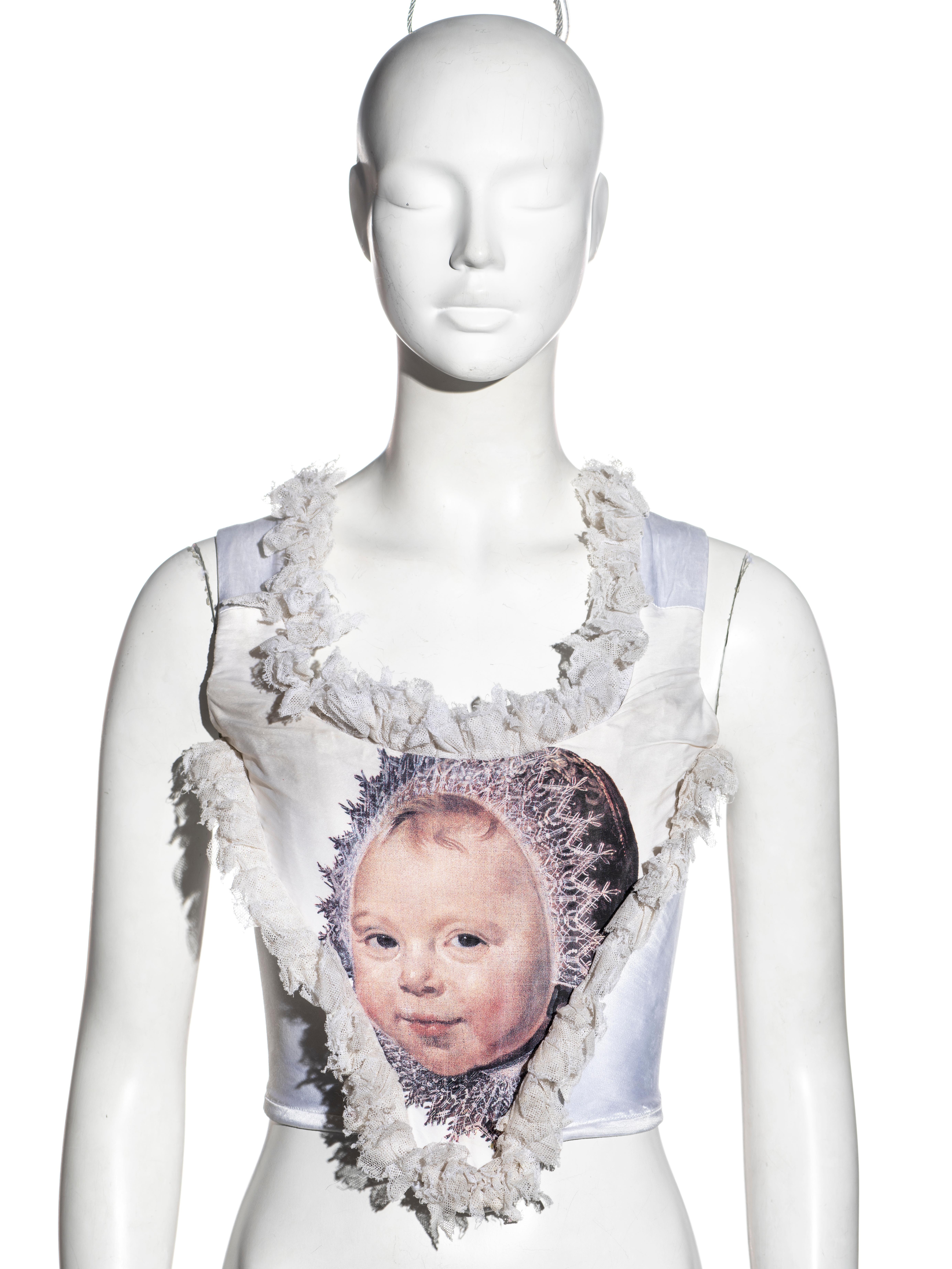 ▪ Rare Vivienne Westwood corset top
▪ Baby print from a detail of Frans Hals - Catharina Hooft with her Nurse c. 1620
▪ Ruffled tulle trim 
▪ Centre-back zipper 
▪ UK 12
▪ Fall-Winter 1992
▪ Made in England