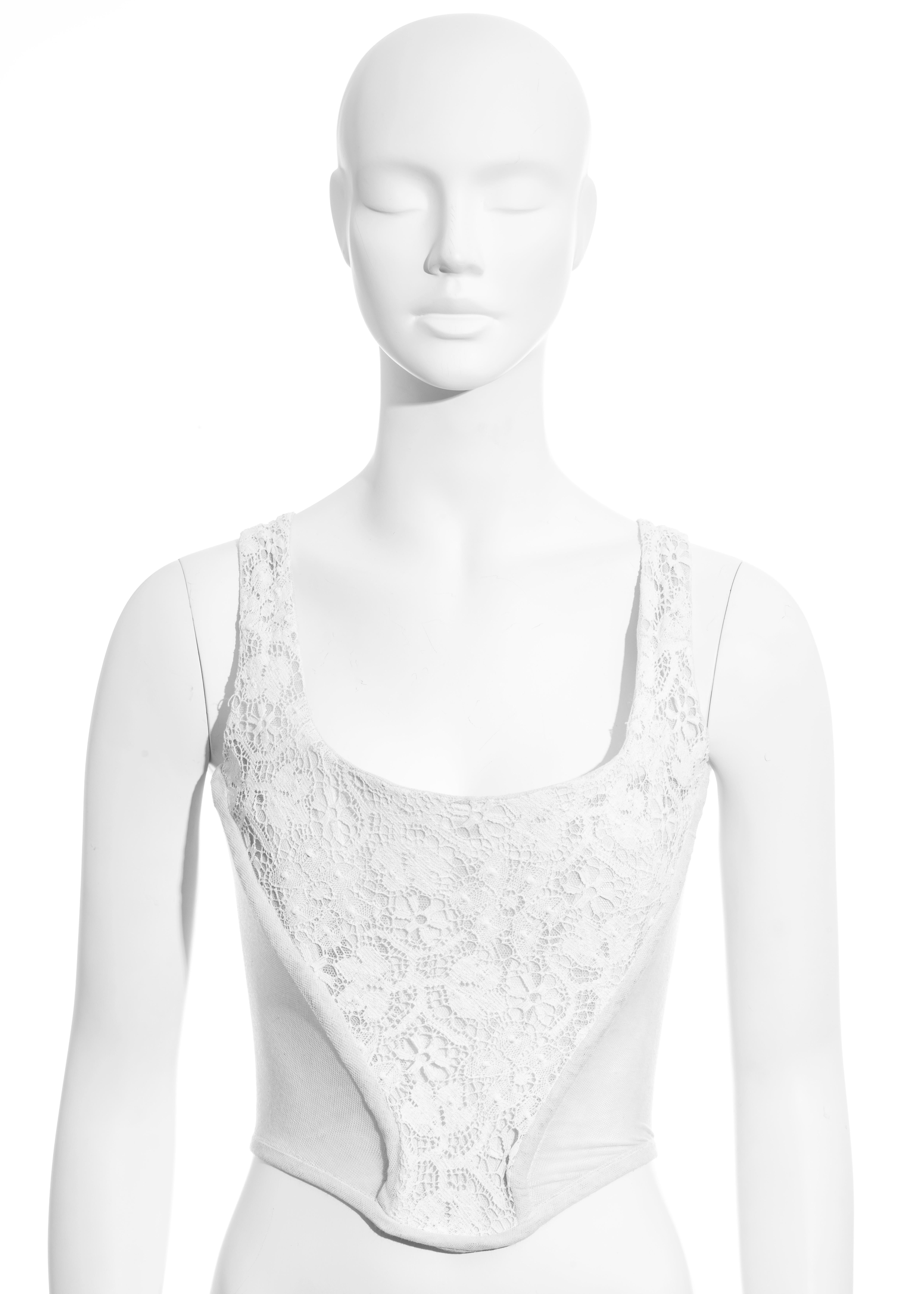 ▪ Vivienne Westwood white corset
▪ Cotton lace front and back panel 
▪ Mesh sides 
▪ Back zip fastening 
▪ Internal boning 
▪ UK 12 - FR 40 - US 8
▪ Fall-Winter 1994
