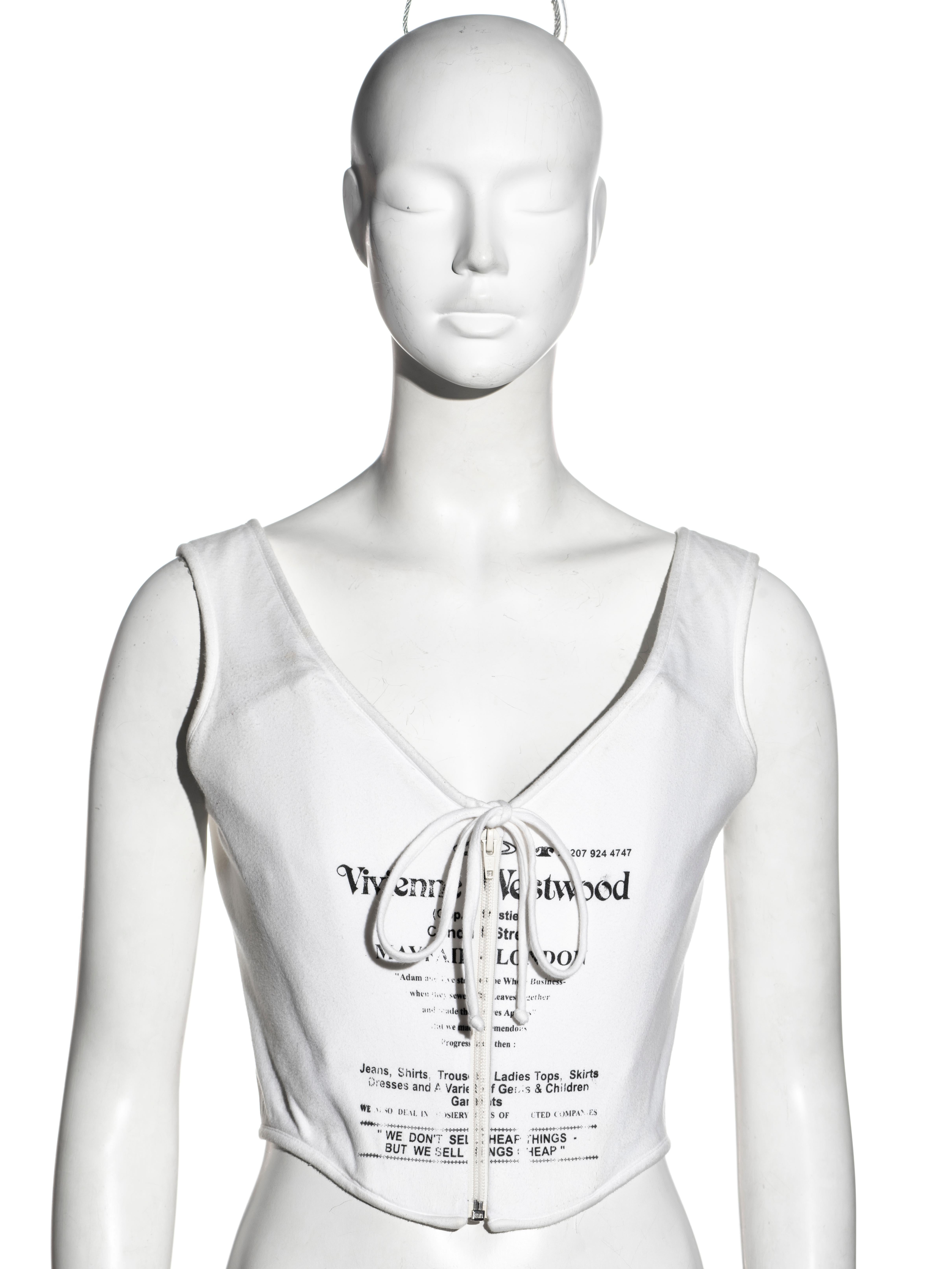 ▪ Vivienne Westwood corset top
▪ Spring-Summer 2002
▪ White cotton jersey 
▪ Black text print of a Vivienne Westwood flyer, advertising the Conduit Street store in London
▪ Centre-front zipper
▪ Gold label 
▪ UK 14