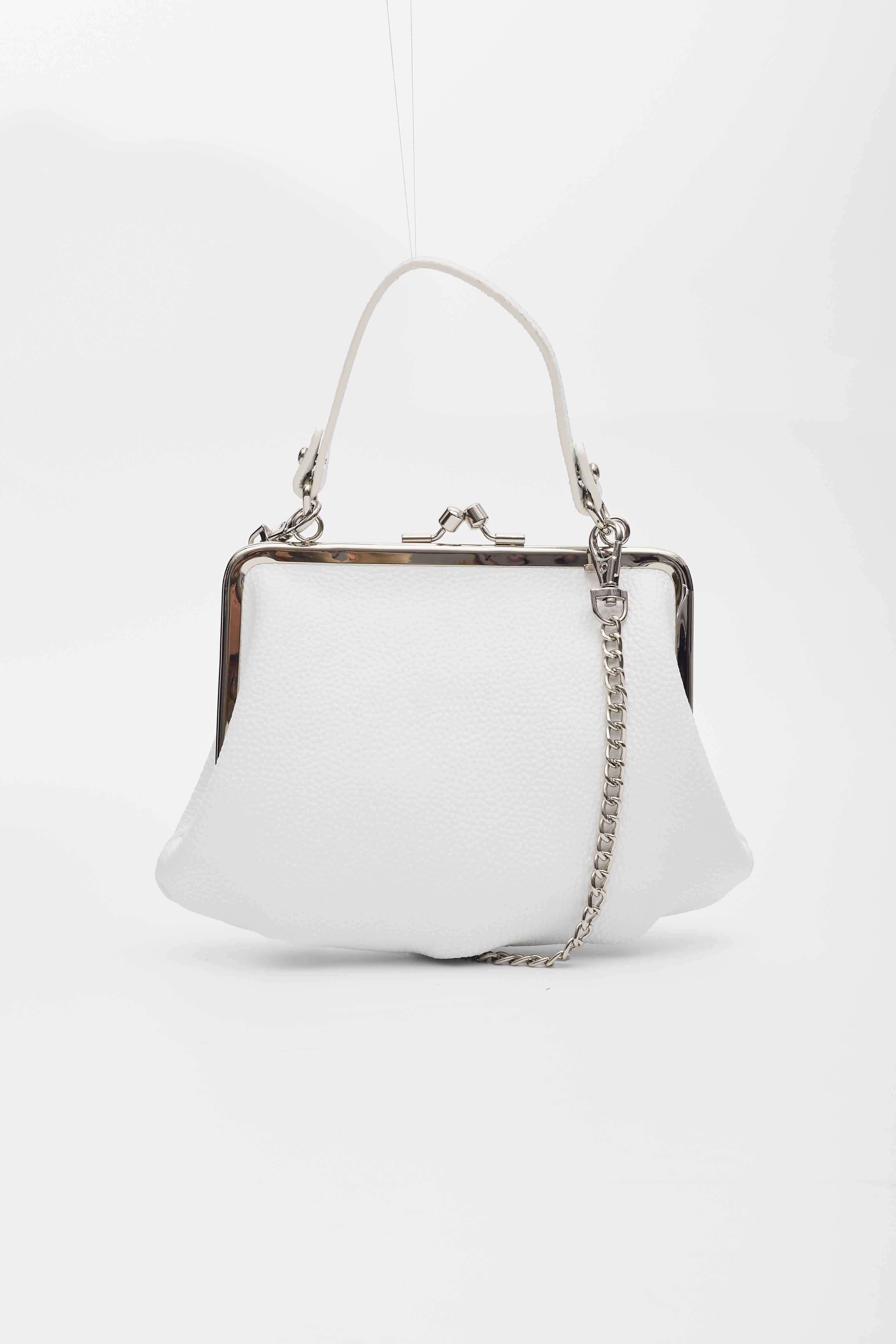 White. Made from nappa leather. Silver hardware. Signature Orb plaque detail. Clasp fastening. Main compartment with logo cotton lining. Long top handle Detachable chain-link shoulder strap.

Material: Leather
Measures: Height 4.7” x Length 6.7” x