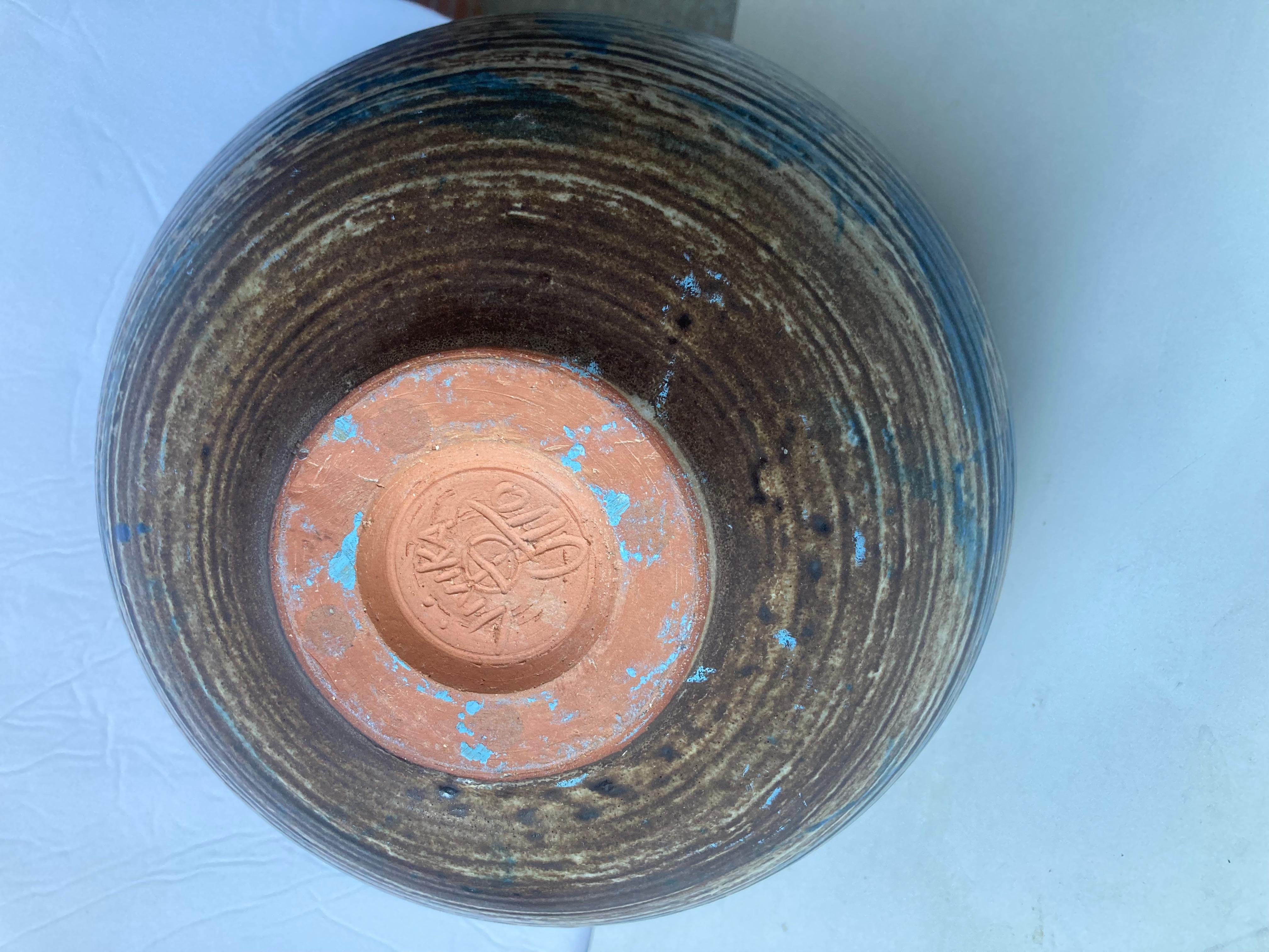 Beautiful and rare shape in this vase by Vivika and Otto, with an abstract design.