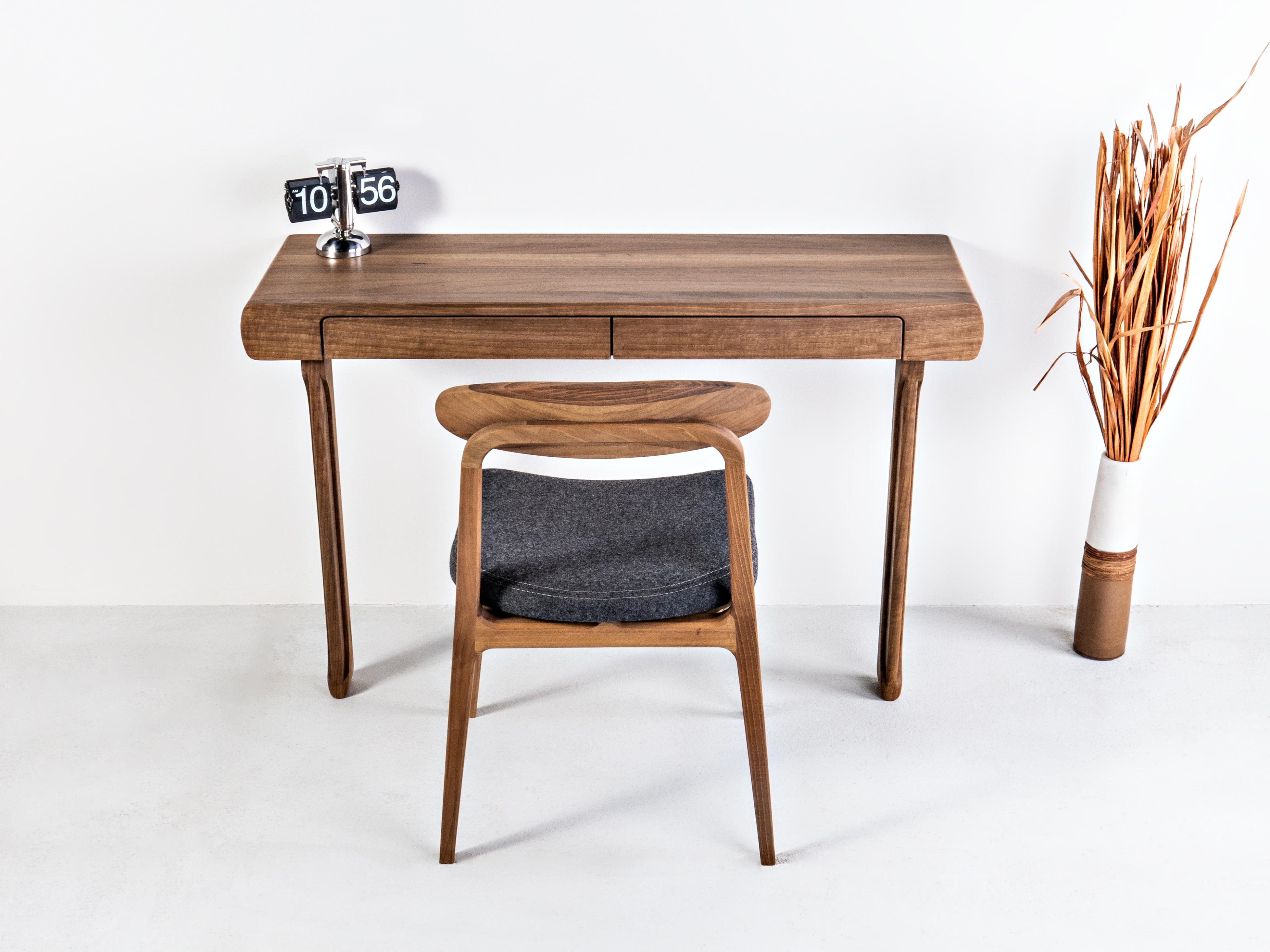 This table of minimalistic look can be used as a dressing table in a bedroom, a mini desk or a console in the hall. It is also suitable for both public and commercial use.
With clean and clear lines, an interesting semi-oval profile with discreetly