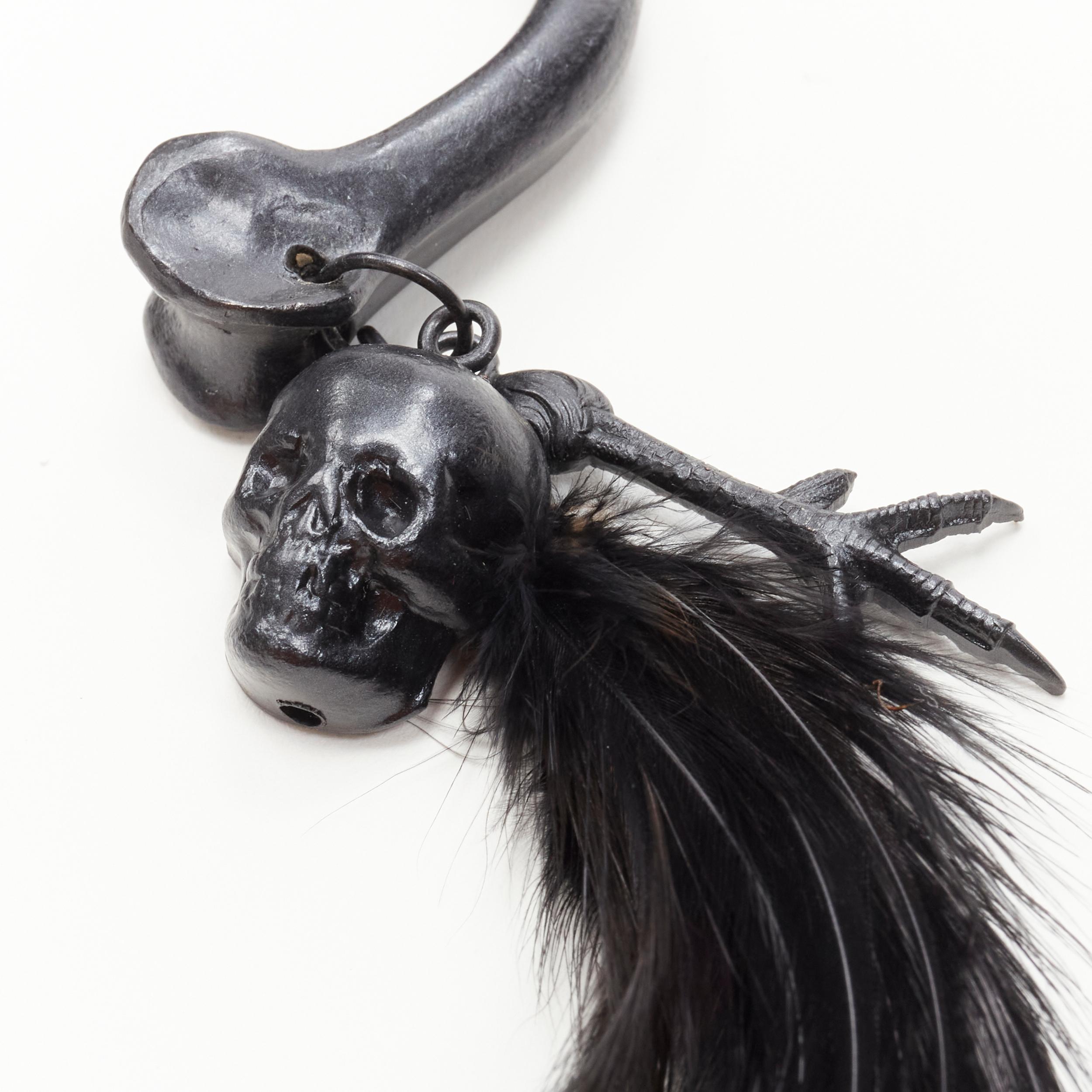 VL PARIS black metal skull raven claw feather goth bone bangle
Reference: ANWU/A00307
Brand: VL Paris
Material: Metal, Feather
Color: Black
Pattern: Animal Print
Closure: Pull On
Extra Details: Embossed logo on end of bone shaped