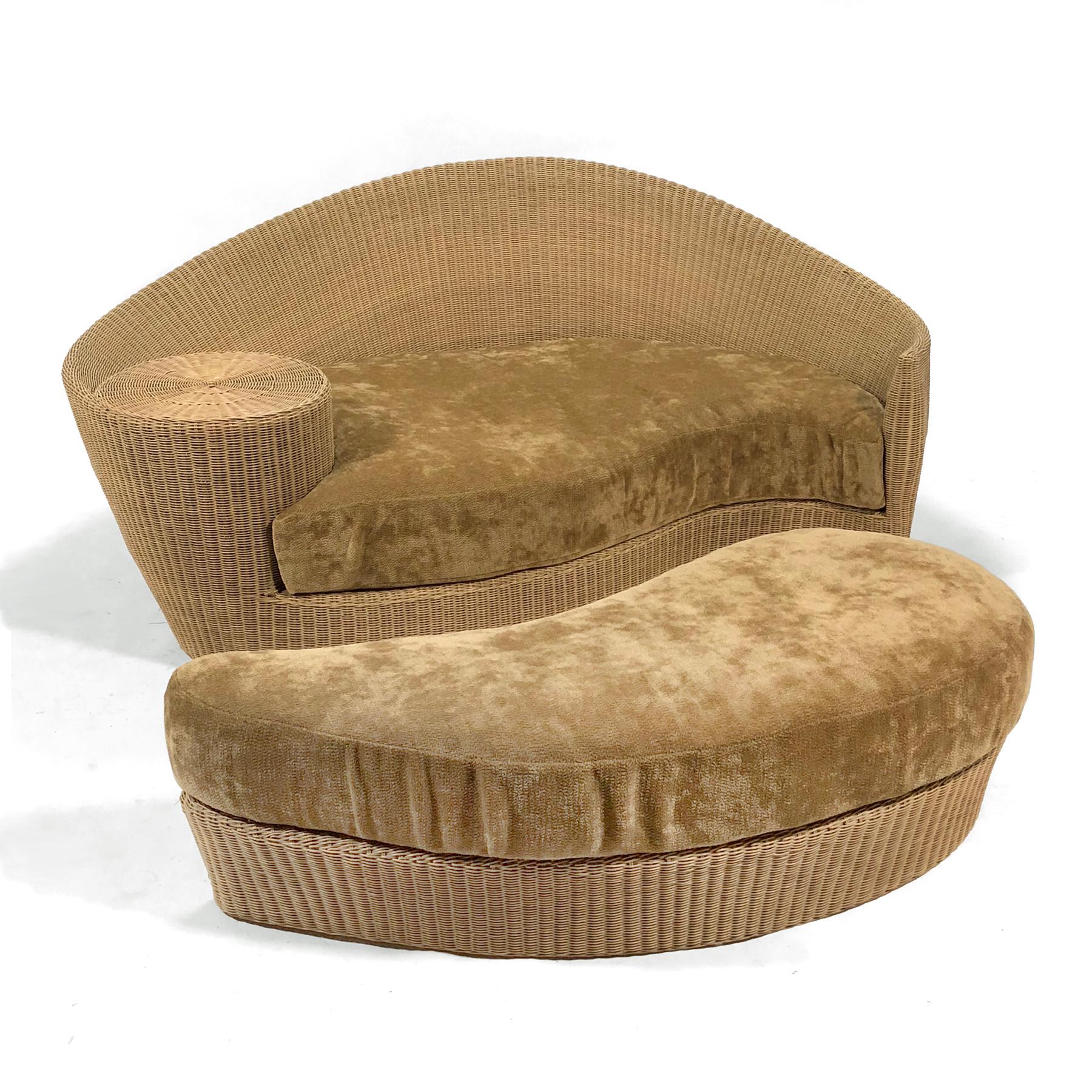 Kagan's design for Barlow Tyrie is a perfect example of his design aesthetic. The undulating, organic form that references a nautilus envelopes the sitter and provides a small table surface. The nesting ottoman increases the seating surface. Crafted