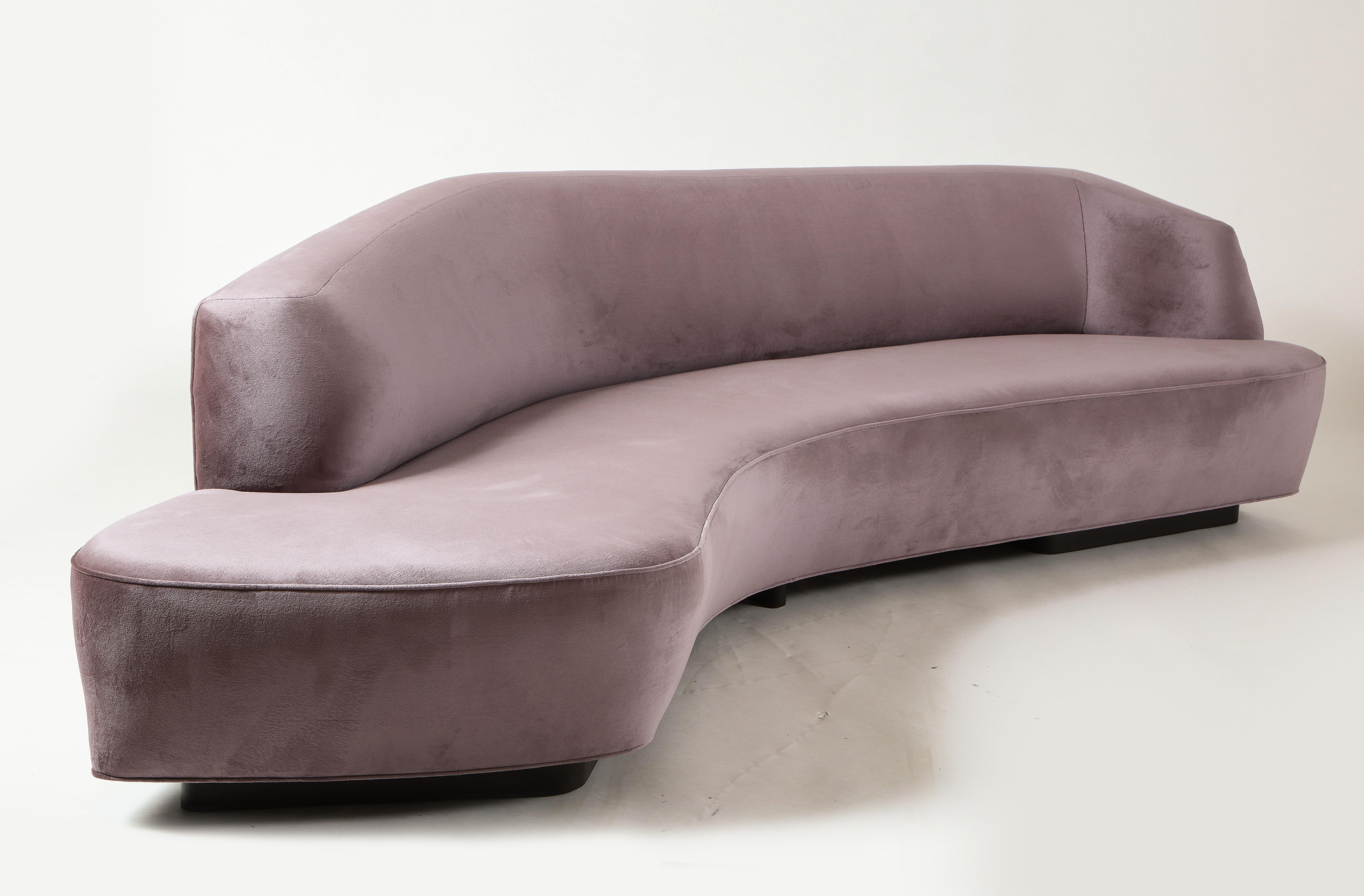 Organic inspirations take an architectural turn in the Korduda Sofa, making it a perfect silhouette to define a seating arrangement. Faceted lines finished with soft curves create an alternative to classic Kagan curved sofas, while 8-way hand-tied