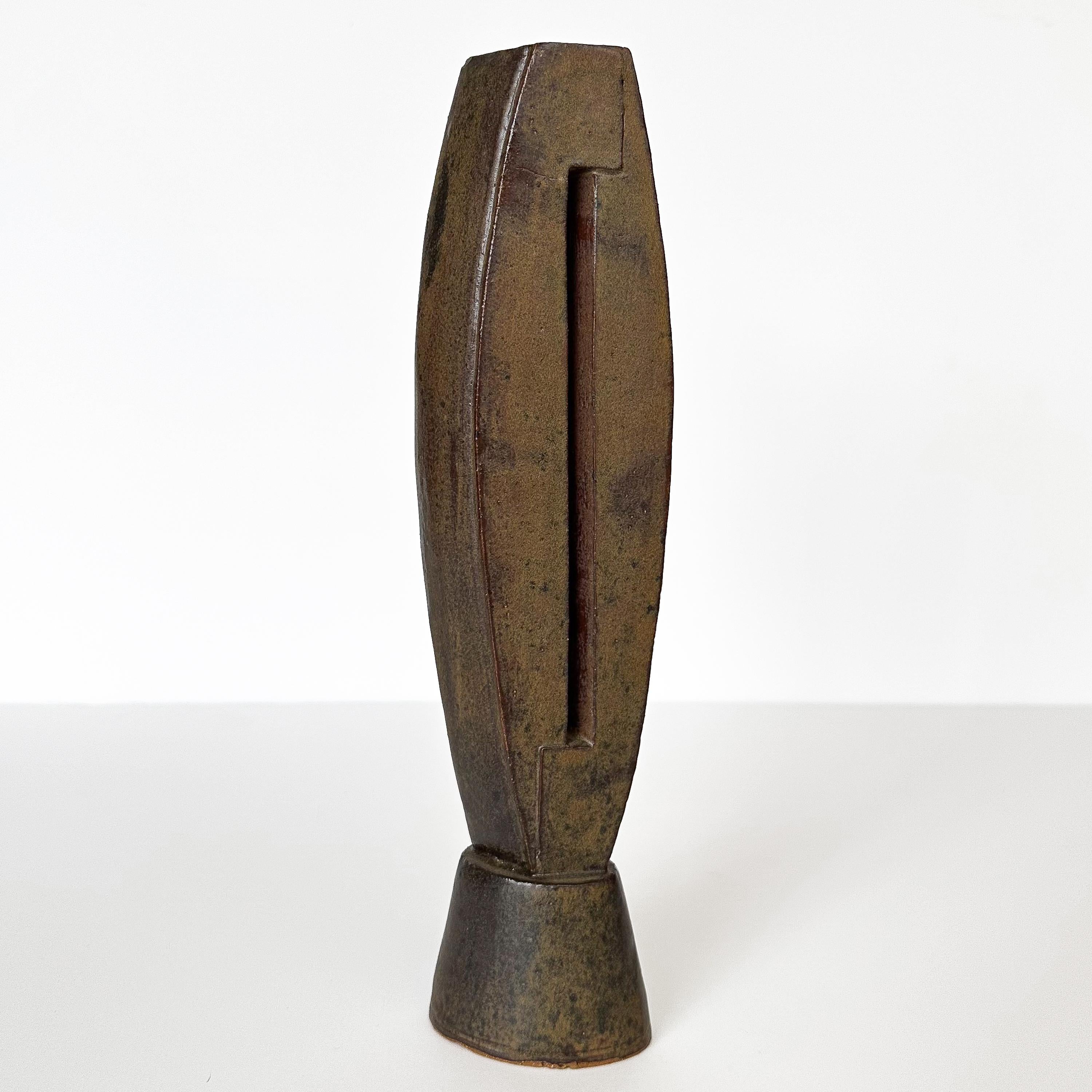 Introducing a spellbinding piece of studio pottery abstract sculpture by the renowned Russian-American artist, Vladimir Donchik (b. 1943). Donchik is celebrated for his masterful blend of form, function, and fluidity, and this piece is a sublime