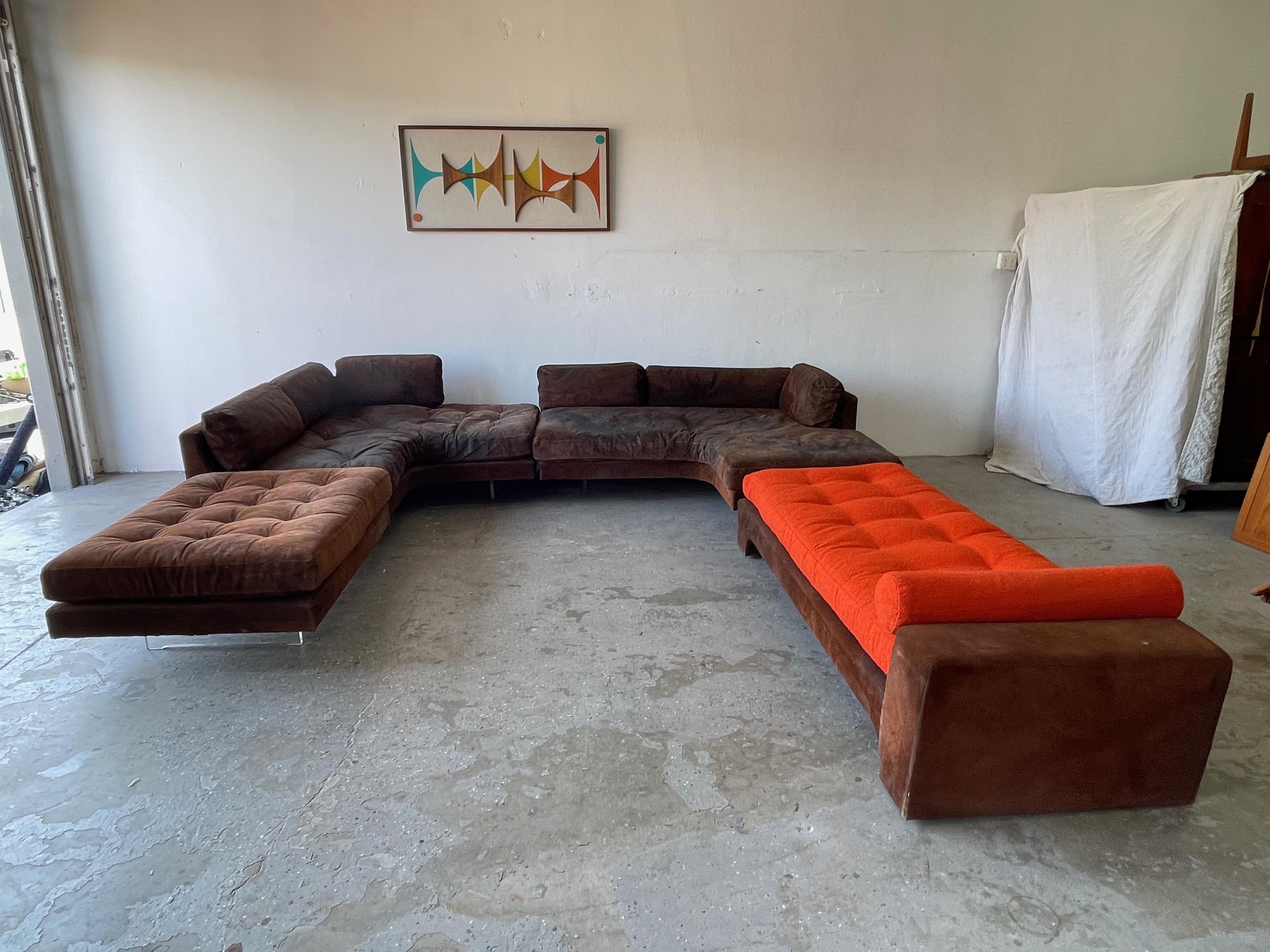 Vladimir Kagan Omnibus 

 Four piece sectional. They can be arranged as pictured, or can be configured as 
you please.

supported on Kagan’s trademark lucite bases, giving the sofa a wonderful floating appearance. 3 out of four still have