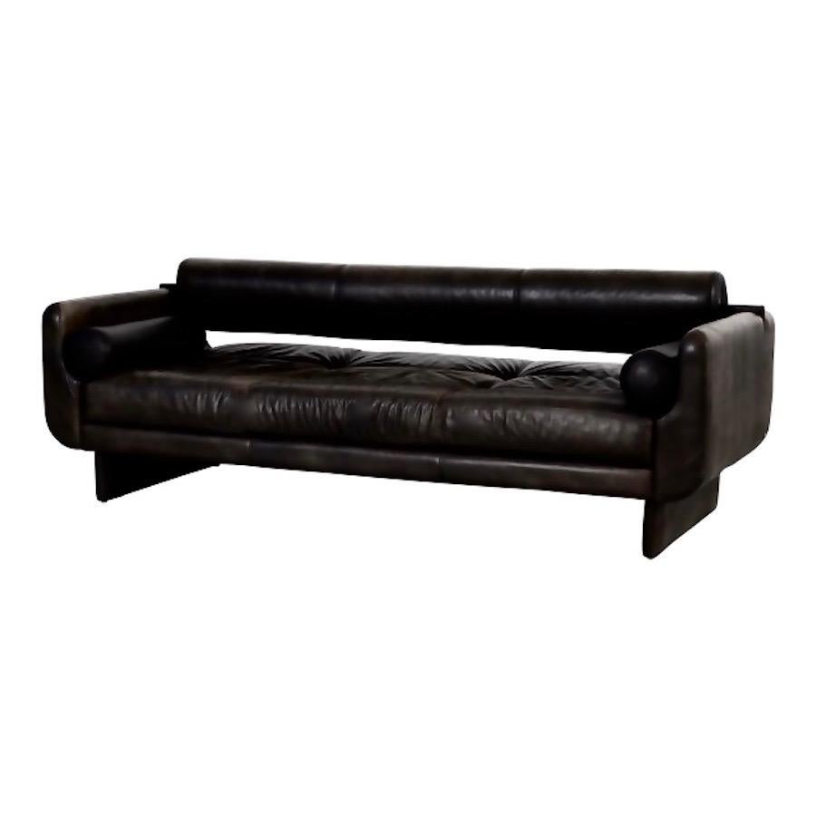 Gorgeous black leather sofa by Vladimir Kagan for American Leather Studios. The sofa is comprised of two removable bolster accent pillows and long back bolster. The removal of the back bolster converts the sofa to a daybed.  

 Reference: The