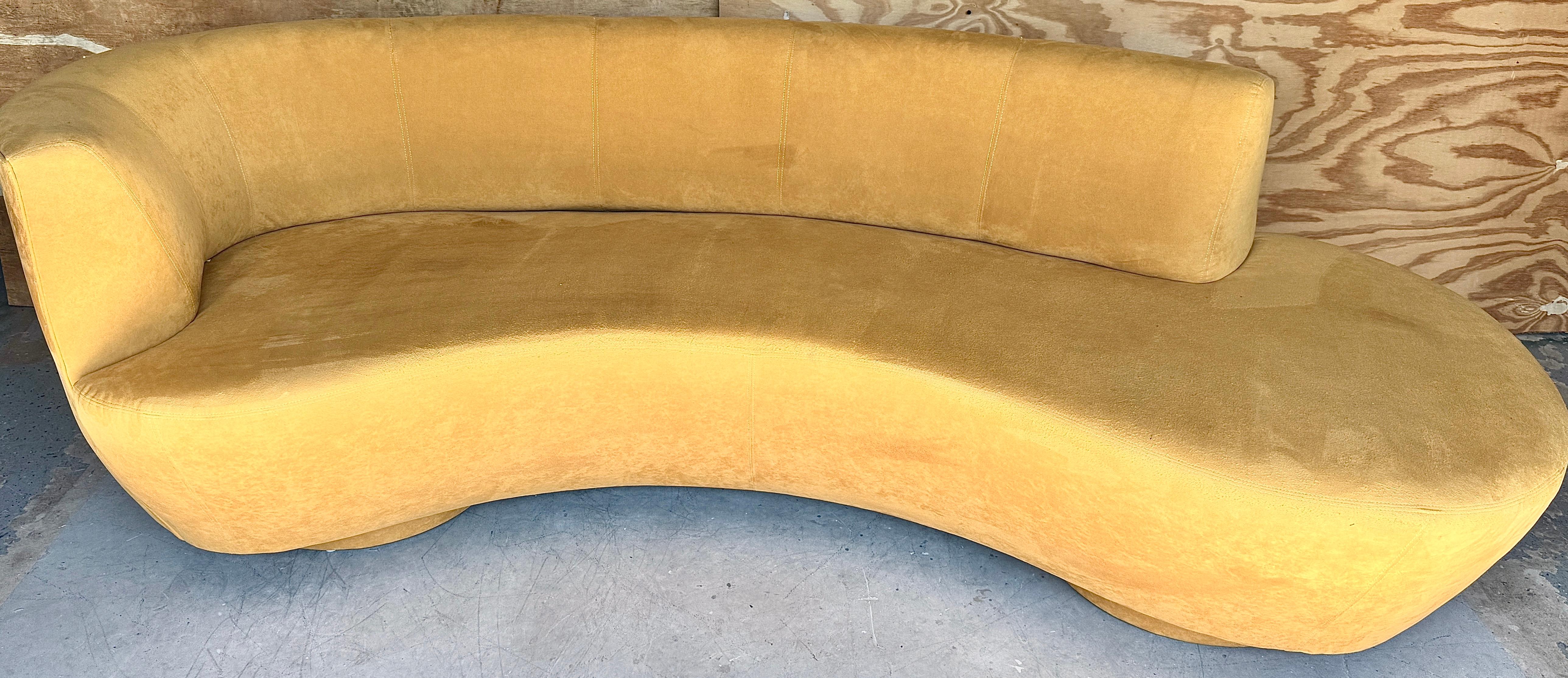 Serpentine Cloud Sofa, in Suede 
USA, circa 1990s

A stunning serpentine cloud sofa, made in the USA circa 1990s. This large-scale cloud sofa measures 98 inches wide, 36 inches deep, and 30 inches high. The seat depth varies from 27 to 32 inches,