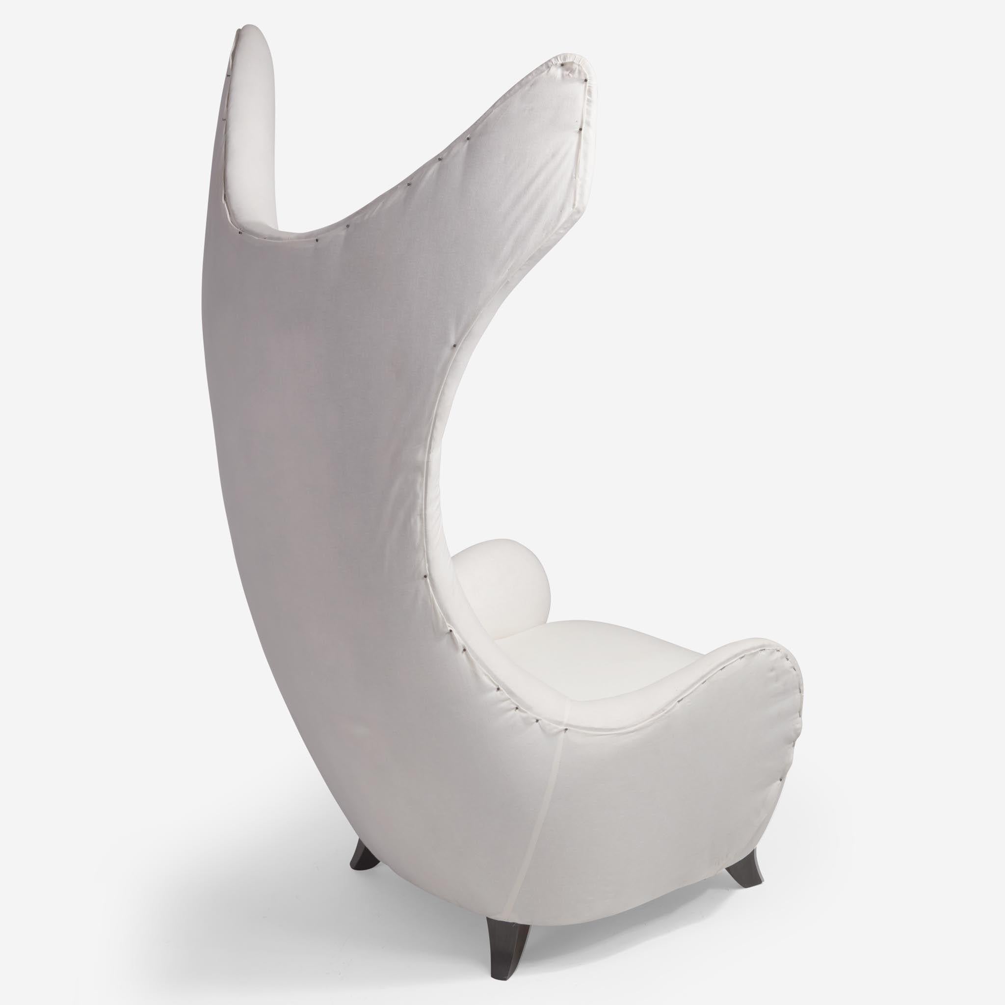 Exceptional and one of a kind dramatic winged back chair designed by Vladimir Kagan for Baroness Lambert. Shortly before Kagan's death, the Baroness had asked for the two chairs to be completed. The chairs served as the model for a design Kagan