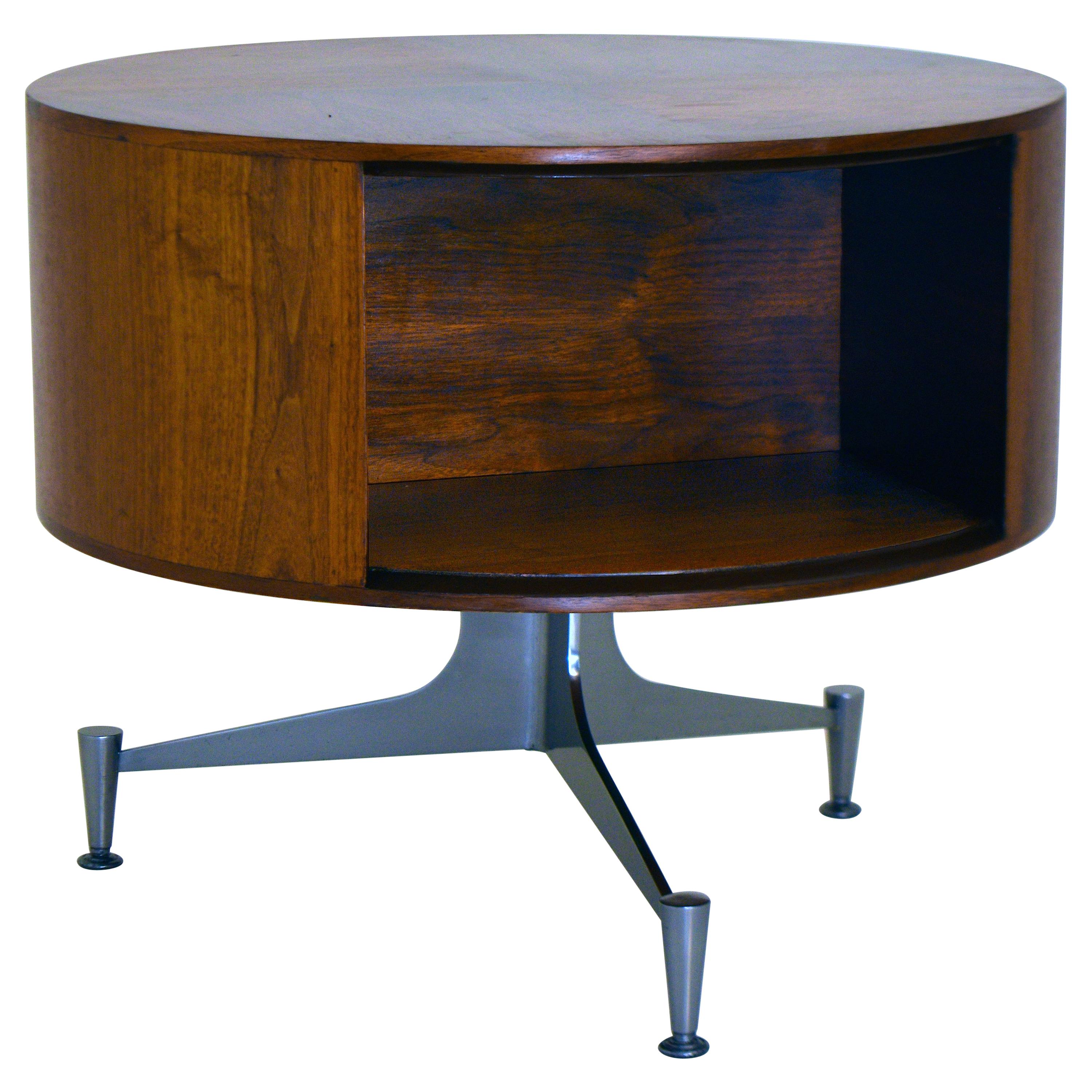 Book end table model K-5184,
Vladimir Kagan Dreyfuss, 1950s, NY, NY. for Grosfeld House Showrooms
Oiled Black American walnut, polished steel
Measures: 26 inch diameter x 21.5 inches tall.

A very rare circular table by Vladimir Kagan custom