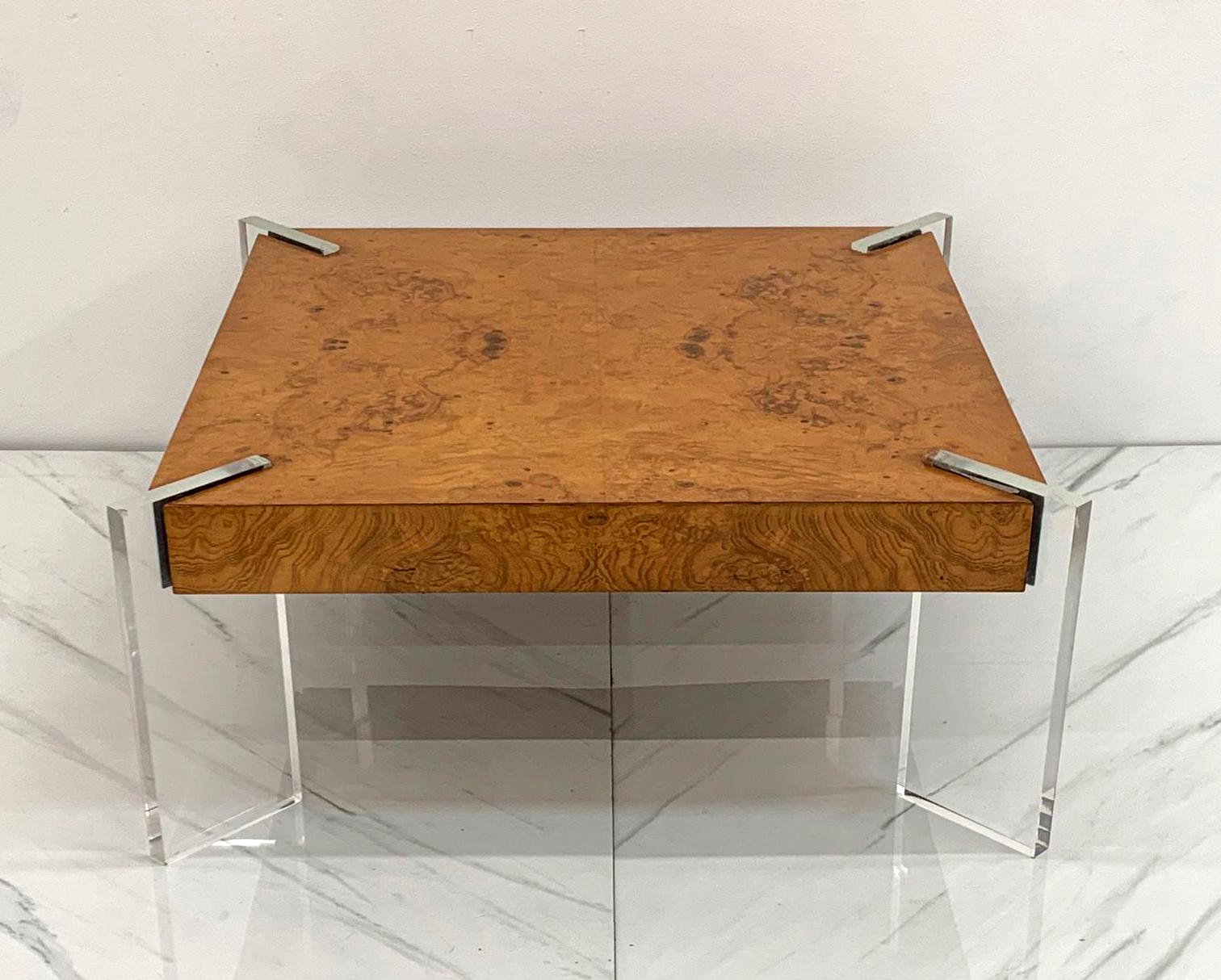 Available right now I have this absolutely stunning burl and lucite / acrylic coffee table designed by Vladimir Kagan. This smaller coffee table is the perfect size and height to be a wonderful coffee table for a tight environment, or a side /