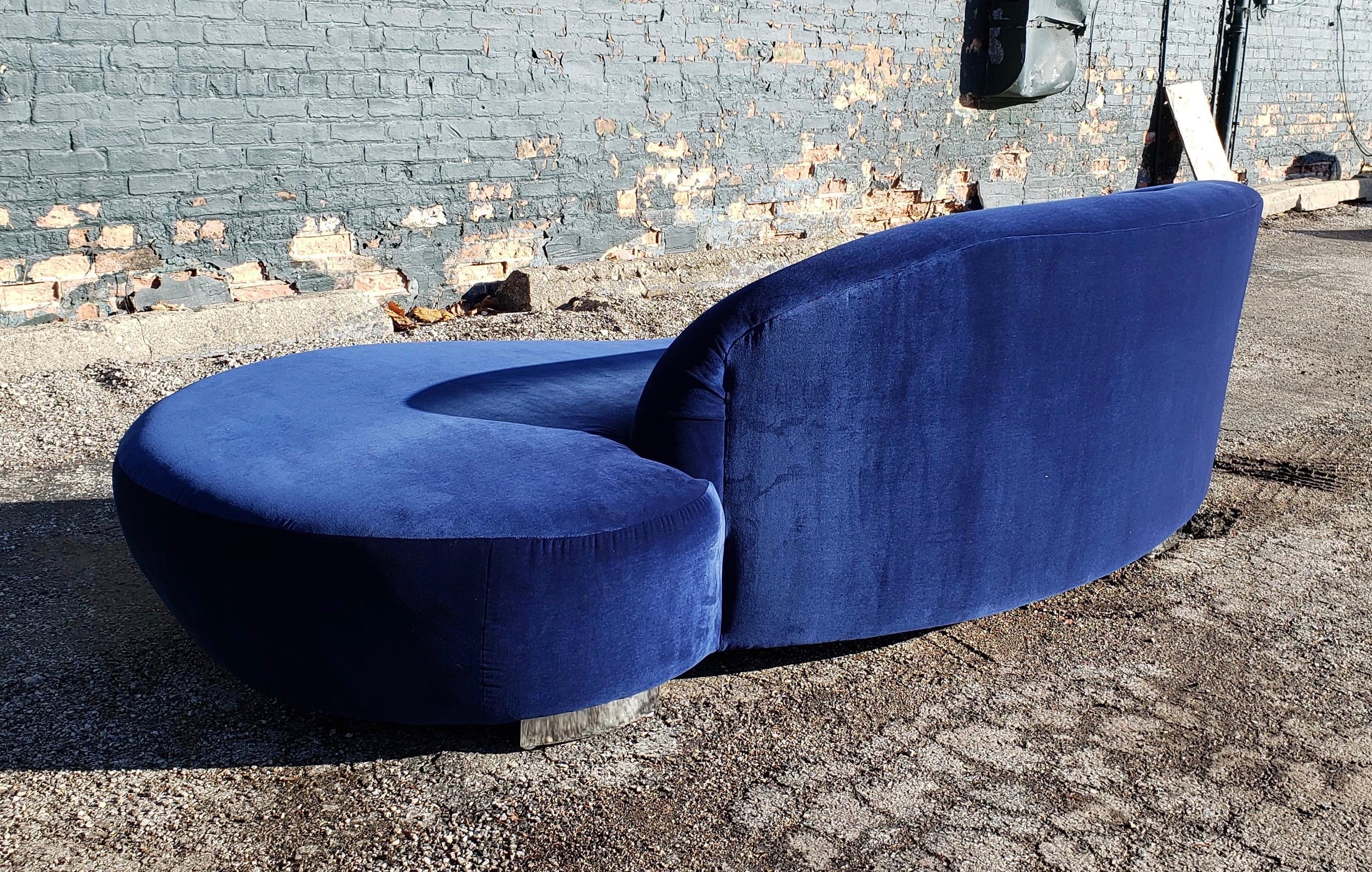 Kagan's famous biomorphic shape sofa in a coveted design has been fully restored in velvet. It's unique shape and curved chrome feet give the sofa a wonderful floating effect.