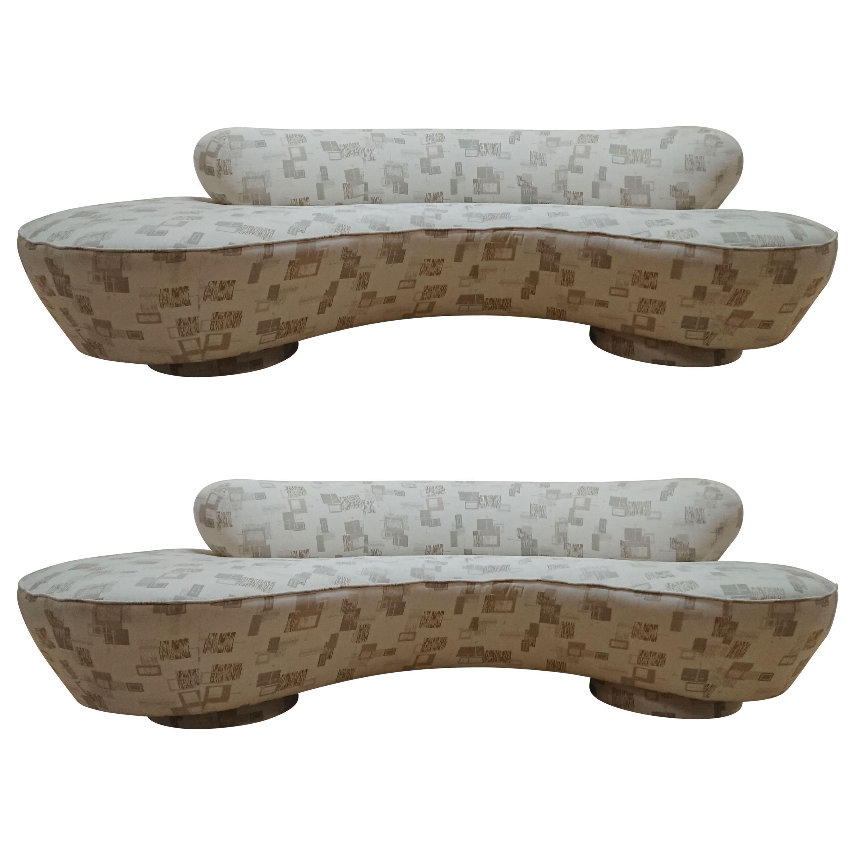 Vladimir Kagan Cloud Serpentine sofa by Directional Furniture.

We have two complimentary form sofas in stock. One has the larger seat on right, and the other on the left.  

Both are in similar condition requiring recovering. some soiling. Stains