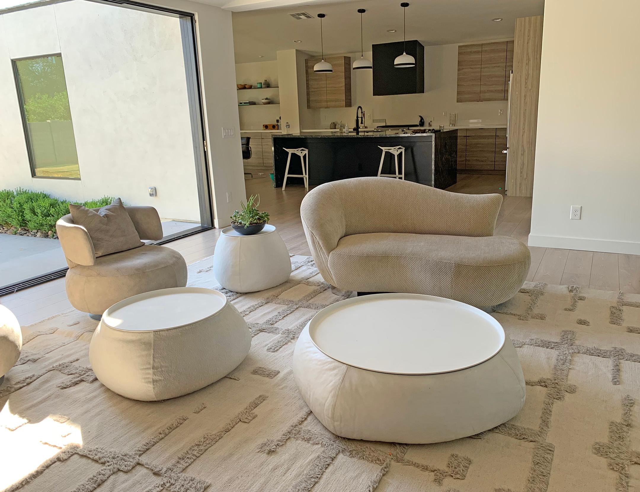An absolutely stunning petite cloud sofa by Vladimir Kagan for Directional. This cloud sofa features Kagan's classic biomorphic shape with the chrome teeth feet that give it a floating effect as if it were a cloud.

The upholstery is a textured