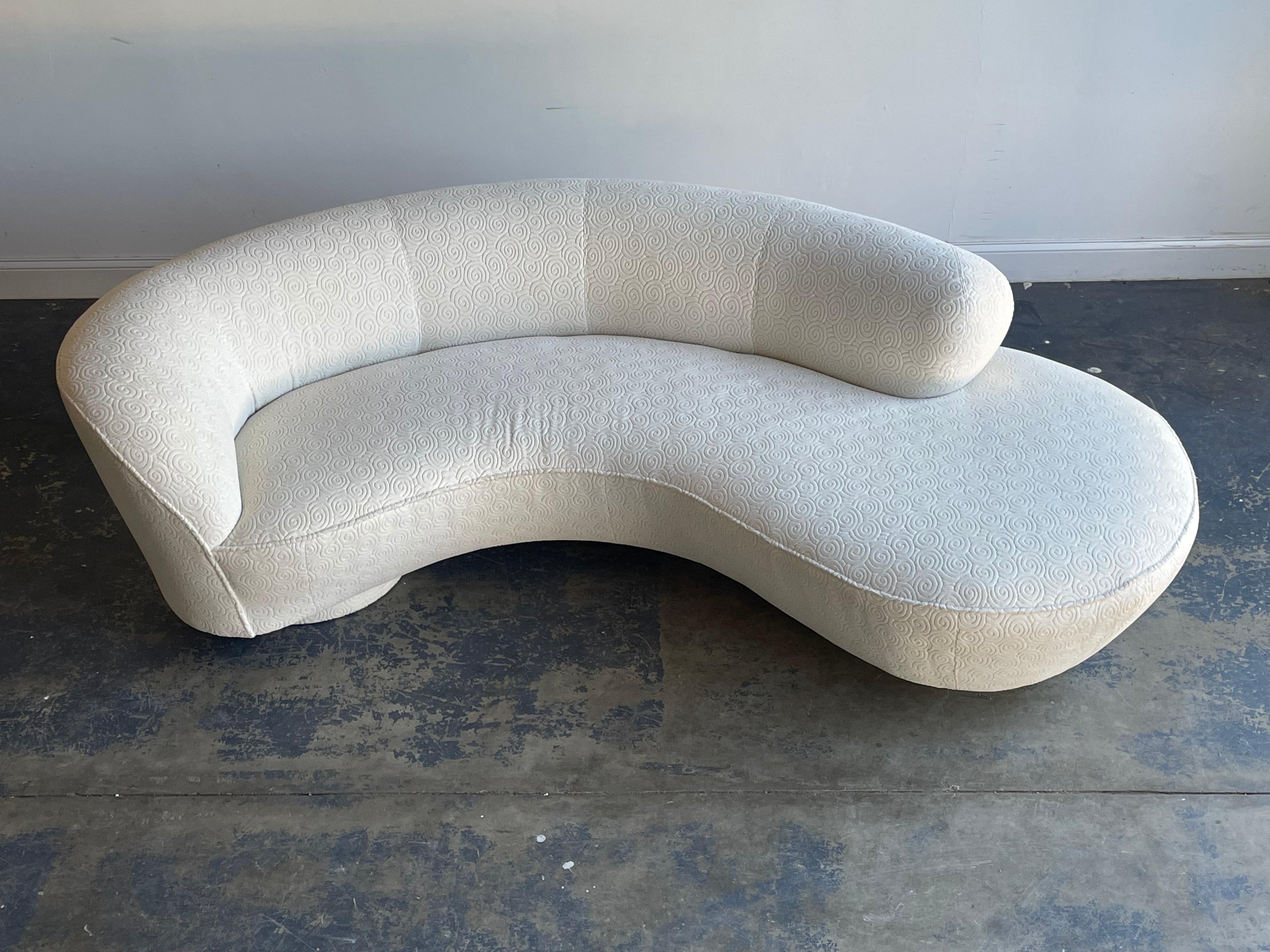 Vintage cloud sofa by Vladimir Kagan for Directional with desired lucite support. Sofa retains originally upholstery which presents very well with no apparent issues. Upholstery is a textured likely cotton velvet.