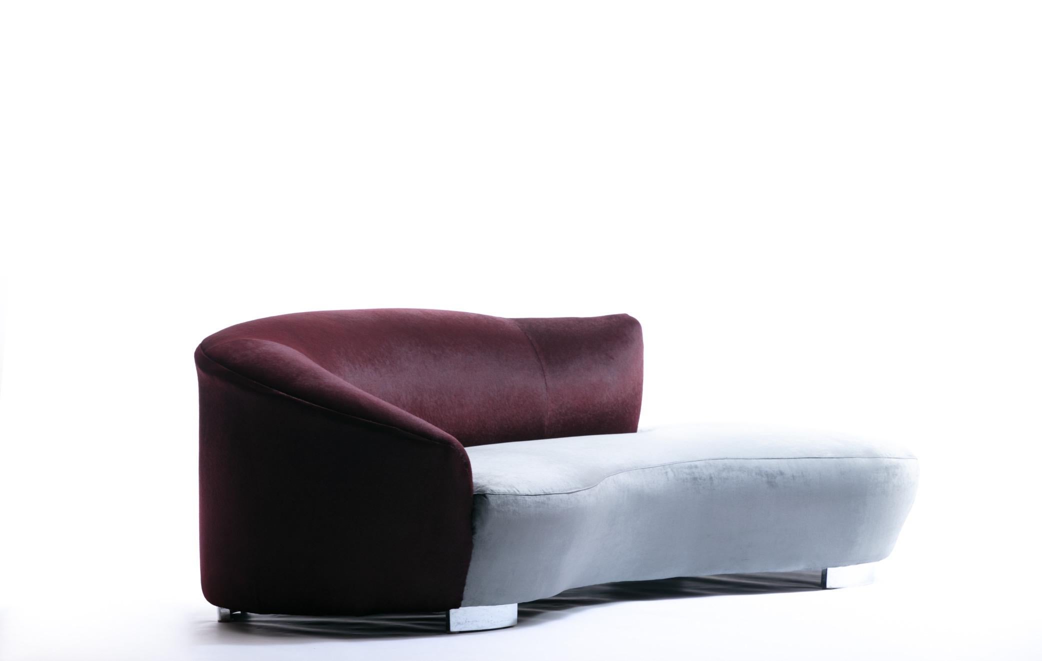 Classic Vladimir Kagan cloud sofa by Directional featuring two-tone reupholstery that highlights the iconic Kagan curves he's so well known for. The sofa back features a claret red faux cowhide that is deep in color with a soft cowhide-like texture.