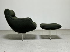 Vladimir Kagan Sillón y otomana giratorios Cosmos