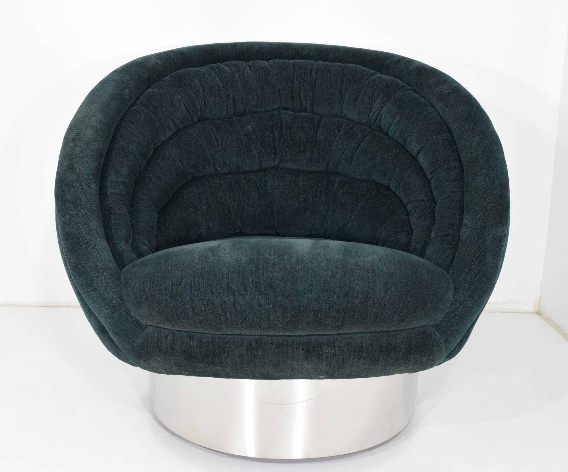 Beautiful and comfortable chair by Vladimir Kagan. Chair swivels and is currently on casters that can be easily removed. We recommend new upholstery.

   