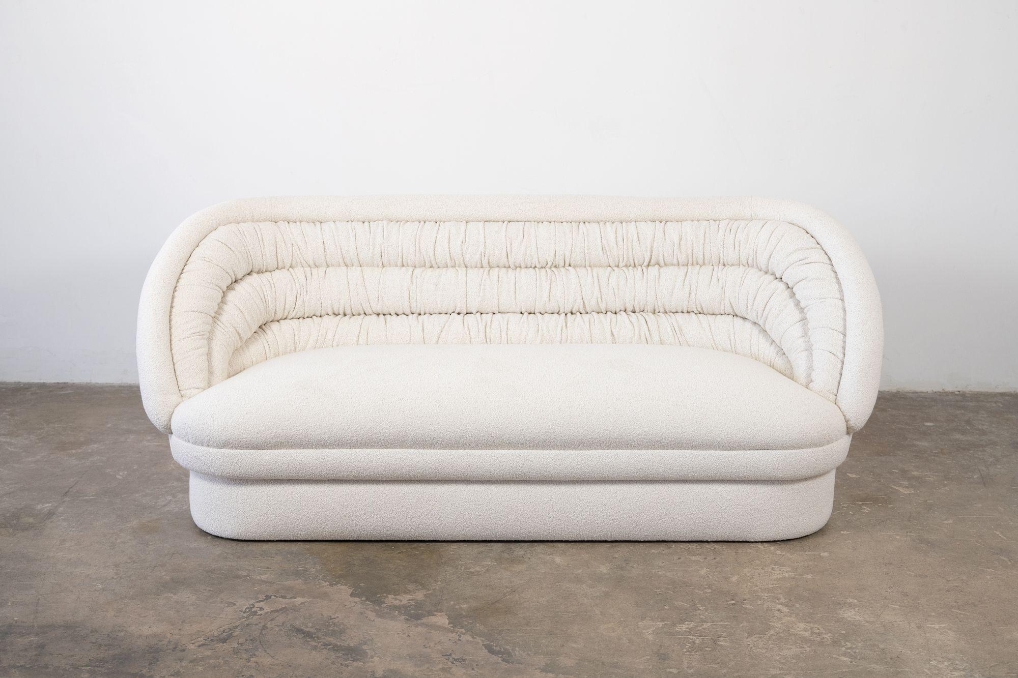 Fully restored with new fabric and new foam. Vladimir Kagan designed Crescent Settee in high grade white Italian Boucle. Two Matchoing chairs available separately.