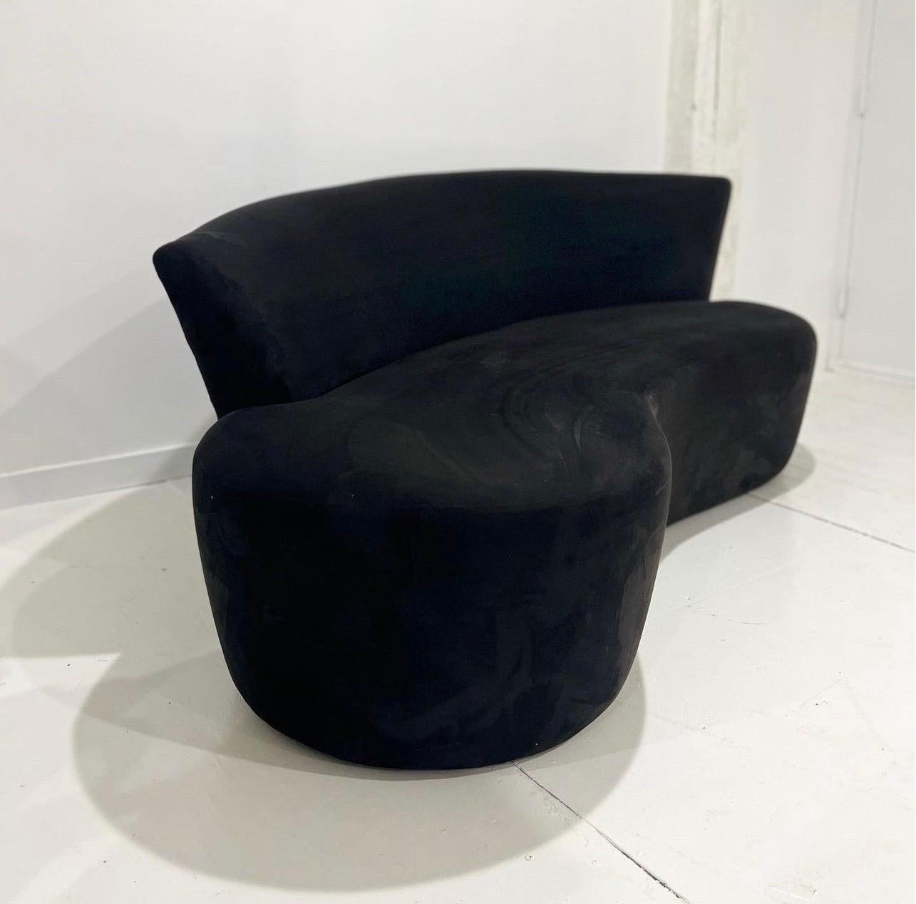 Vladimir Kagan for Weiman / Preview

This modern sculpted sofa features a flowing freeform backrest with unique cutaway style design. Upholstery is a black micro-suede. The sofa is in excellent condition! Absolutely no signs of wear and the