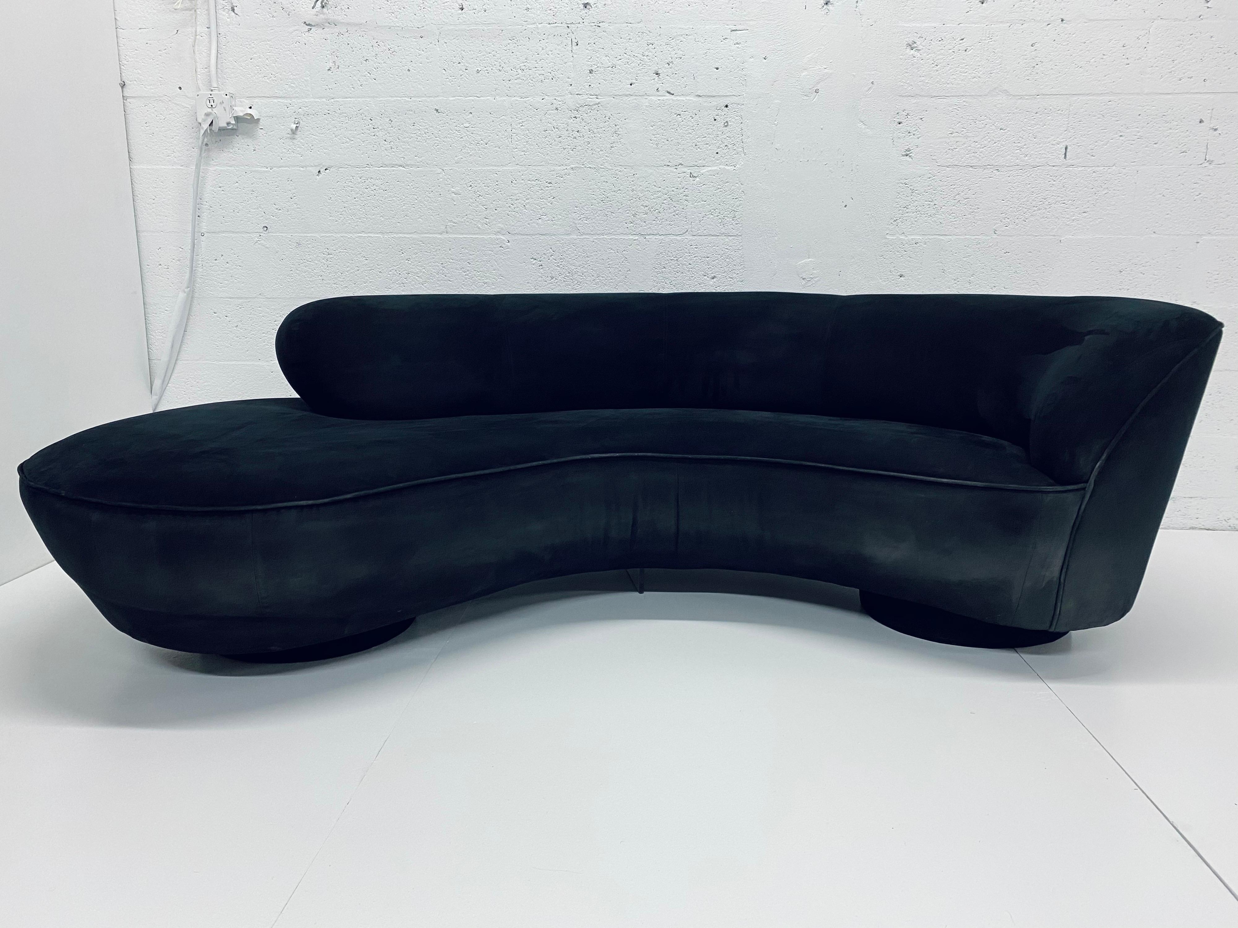 Original Vladimir Kagan Serpentine sofa with black ultra-suede fabric for Directional. Use as is or have reupholstered.

That Galerie offers custom in-house upholstery quotes. This piece will need approx. 18 yards of a medium stretch fabric in a