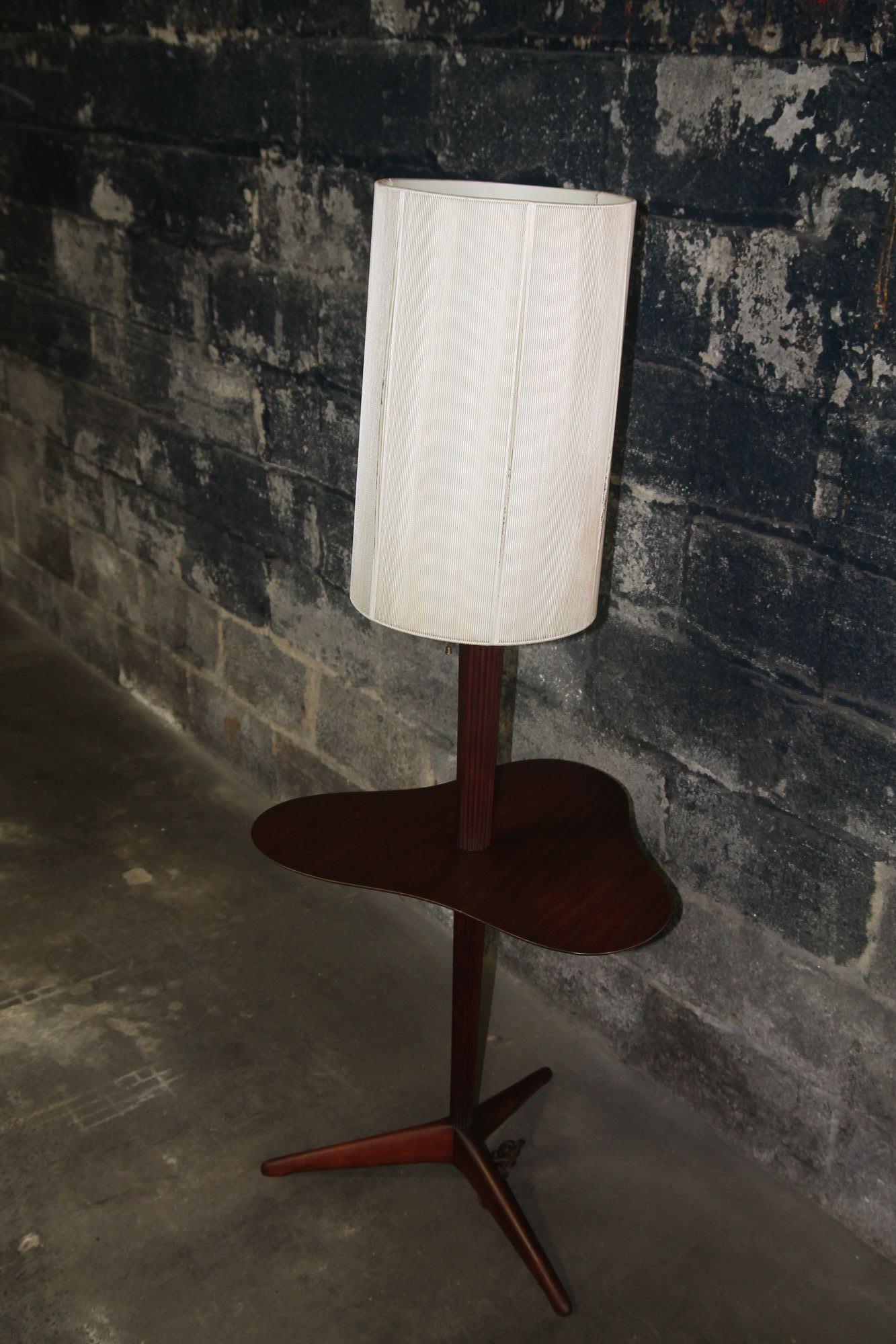 Rare custom floor lamp by Vladimir Kagan for Kagan-Dreyfus. I have never seen another example of this signed lamp. This lamp retains all its original parts. Original shade as some small paint loss on the metal and some discoloration on the inside. I