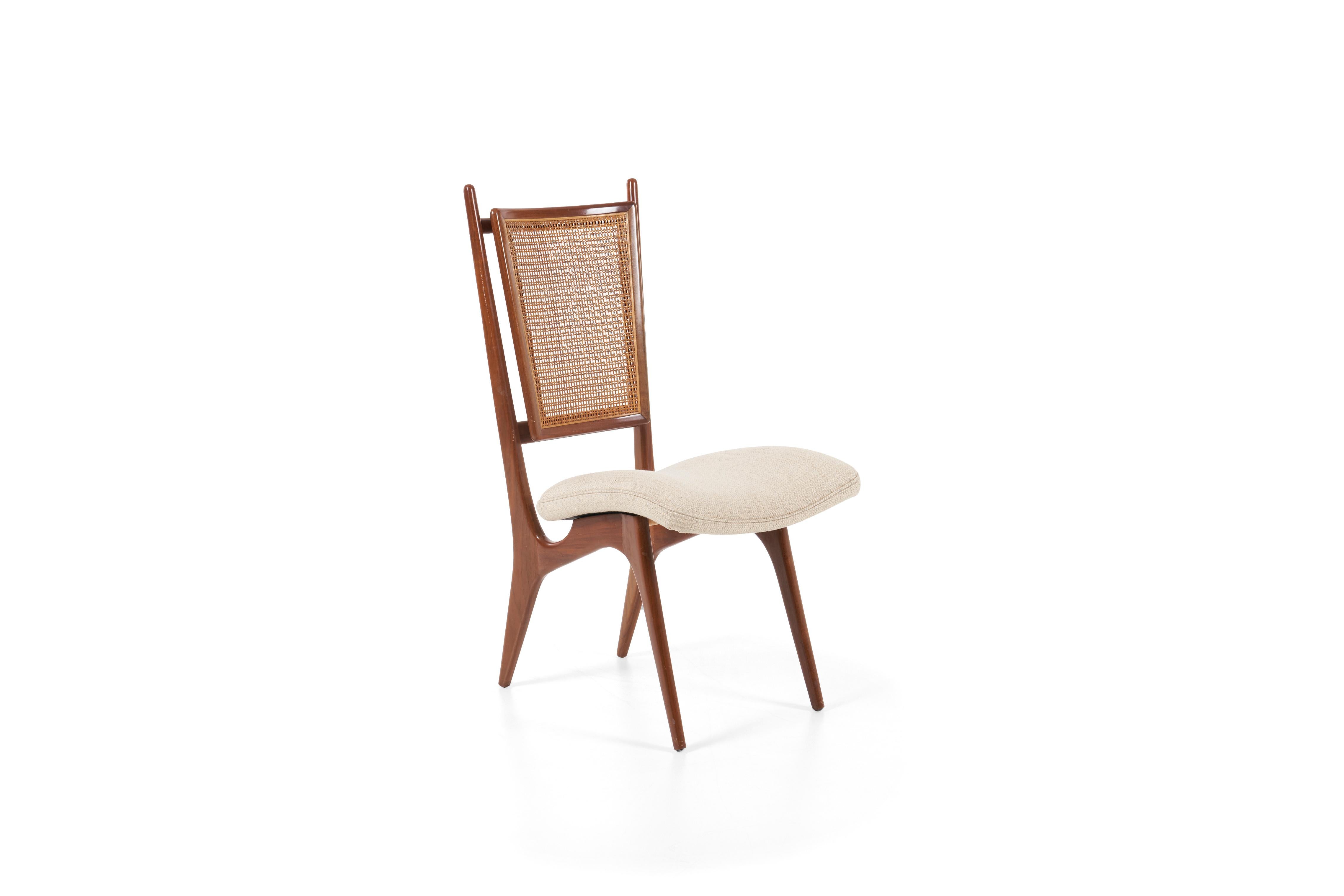 Kagan for Grossfeld House early chair, solid walnut wood frame, retains original patina with cain back. Seat has been reupholstered with woven great plains cotton-poly.
  
