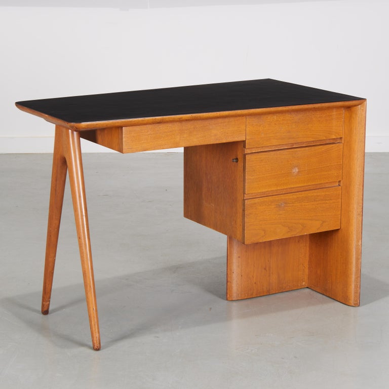 A rare, likely one-of-a-kind, Vladimir Kagan design, employing all of the design touches that make him such an important figure in American Modernism. 

A wonderful melding of rationalist and biomorphic elements, the triangular black laminate