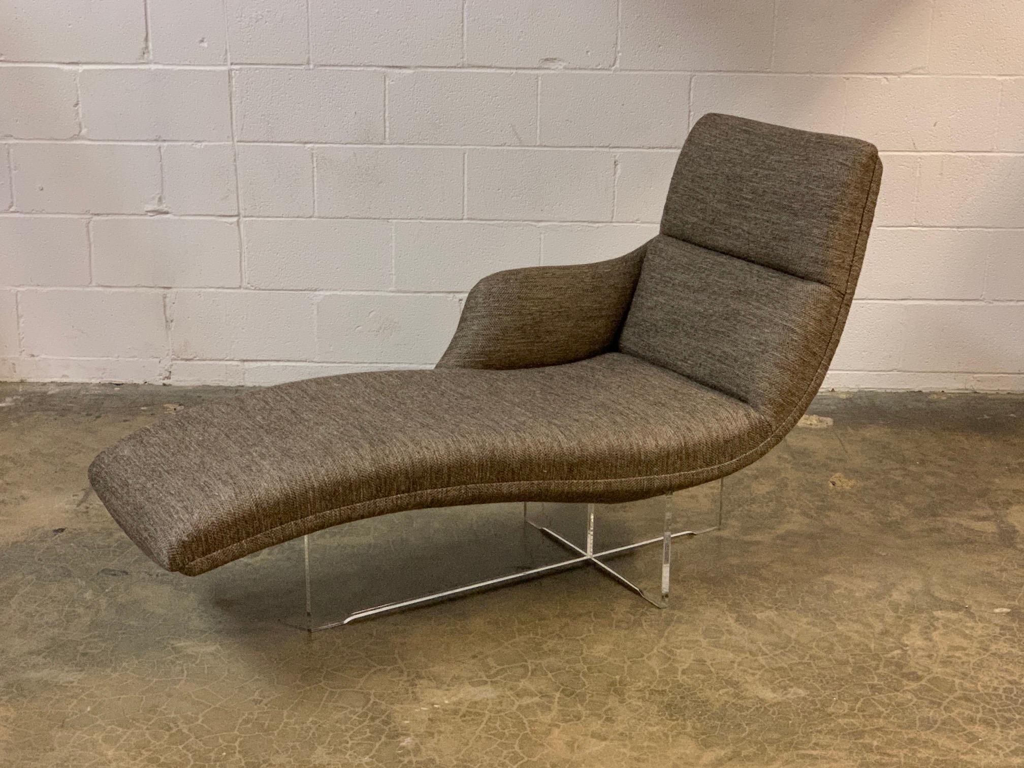 The Erica chaise lounge designed by Vladimir Kagan. Perfectly restored and reupholstered in a beautiful hand woven fabric.