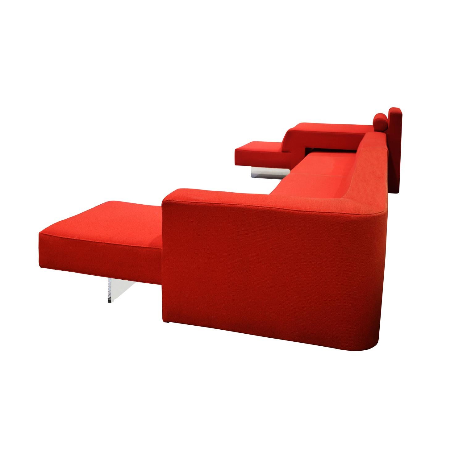 Large sectional sofa, upholstered with lucite bases, by Vladimir Kagan, Omnibus Collection, American 1975. This sofa is completely modular with 1 Corner with extension unit, 1 High-Low unit, and 1 Love seat with extension unit which slides under the