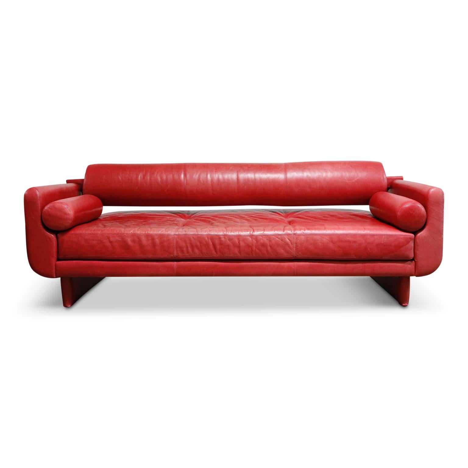 The red leather on this Vladimir Kagan for American leather Postmodern 'Matinee' convertible sofa daybed is absolutely to die for. Beautiful color and patina throughout, featuring high quality leather that Vladimir Kagan and American leather were