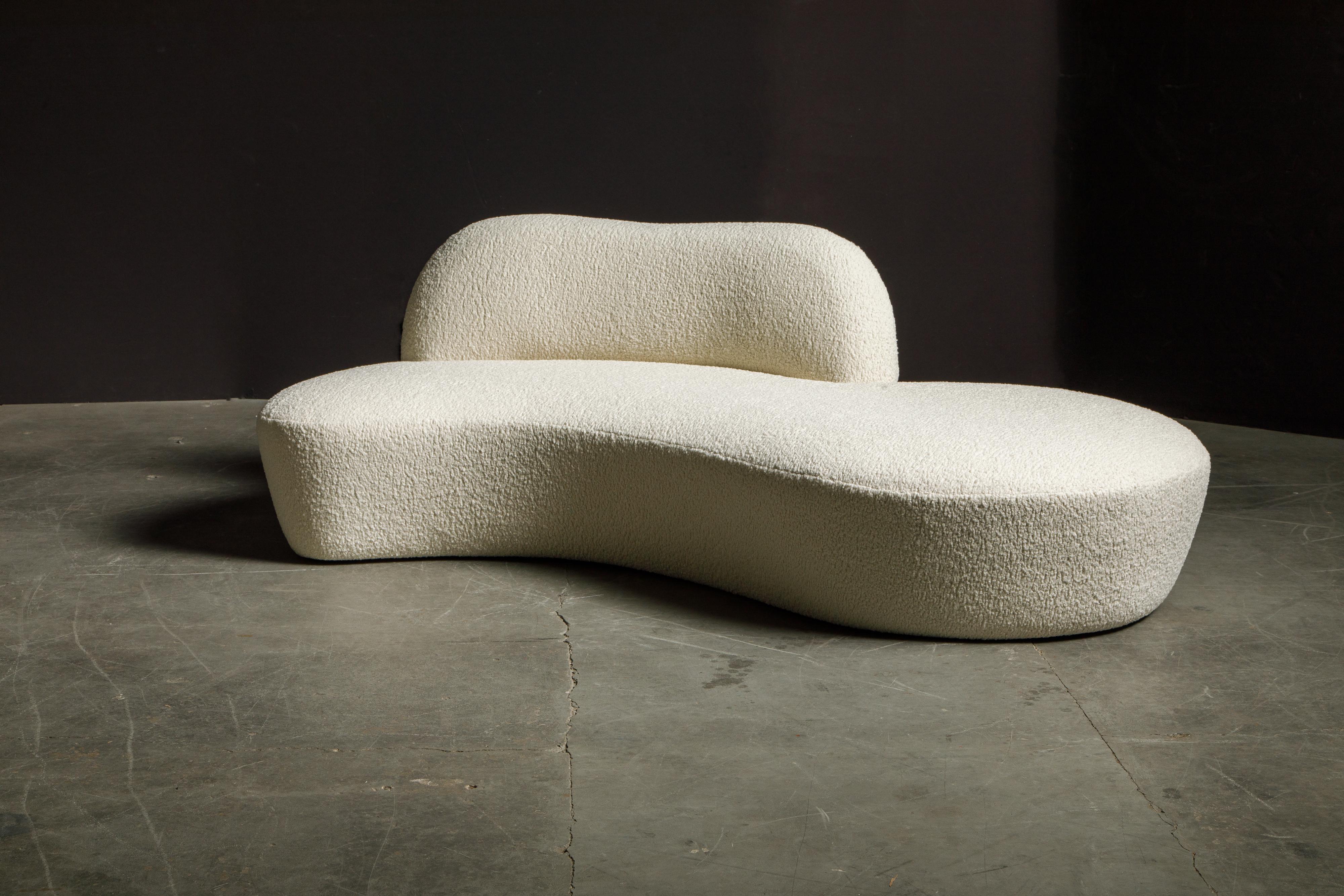 This spectacular example of Vladimir Kagan design was produced by American Leather for a short time, circa early 2000's, and was just reupholstered in a gorgeous white Bouclé fabric, signed underneath with original American Leather and retailer