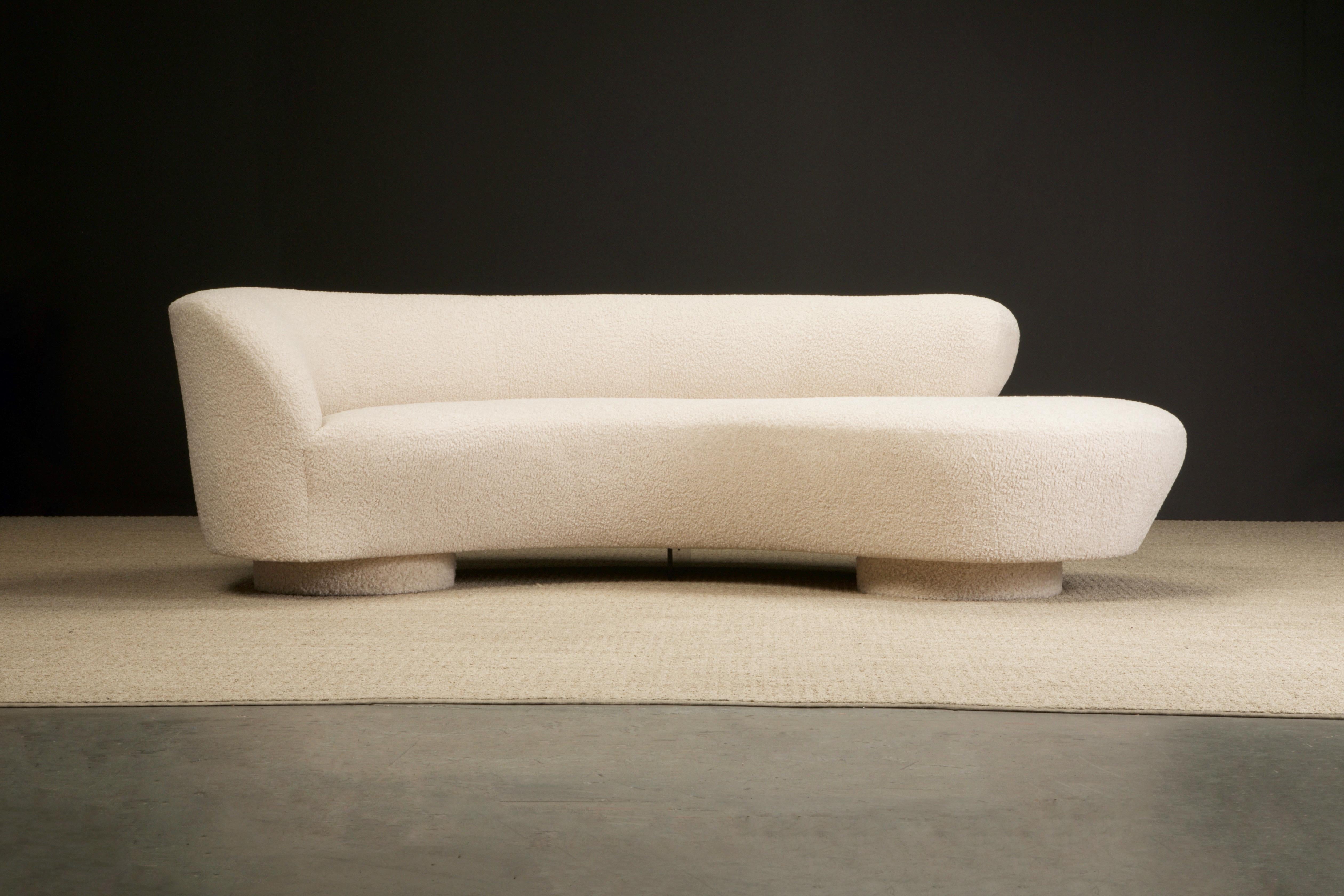 This spectacular Vladimir Kagan 'Cloud' sofa was produced by Directional Furniture in the 1980s and was just newly reupholstered in a gorgeous nubby bouclé fabric, and is signed underneath with Directional label and has the lucite center support