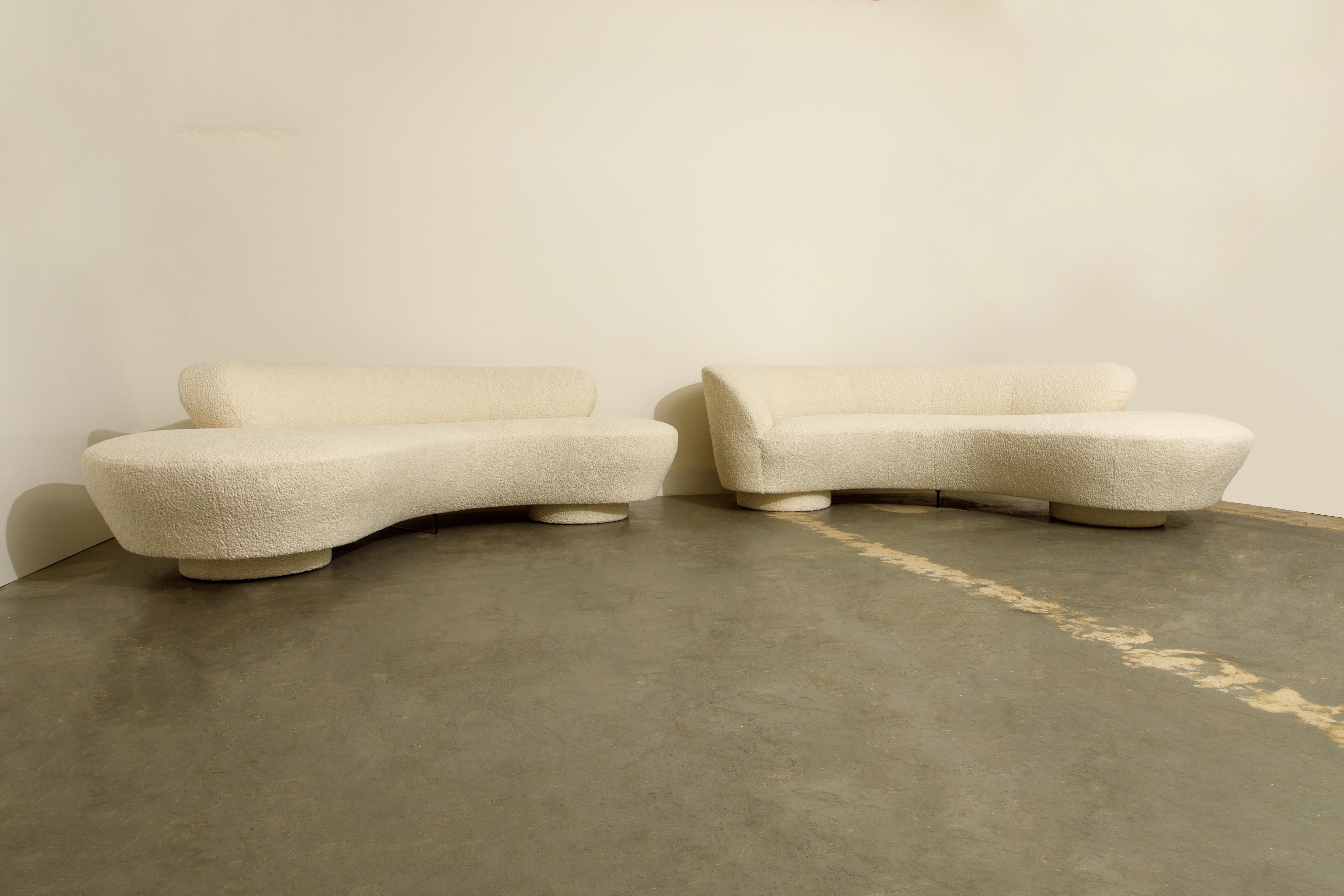 This spectacular pair of Vladimir Kagan 'Cloud' sofas were produced by Directional in circa 1980 and were newly reupholstered in a gorgeous white nubby bouclé fabric, both sofas signed underneath with Directional labels. 

Kagan, inspired by his