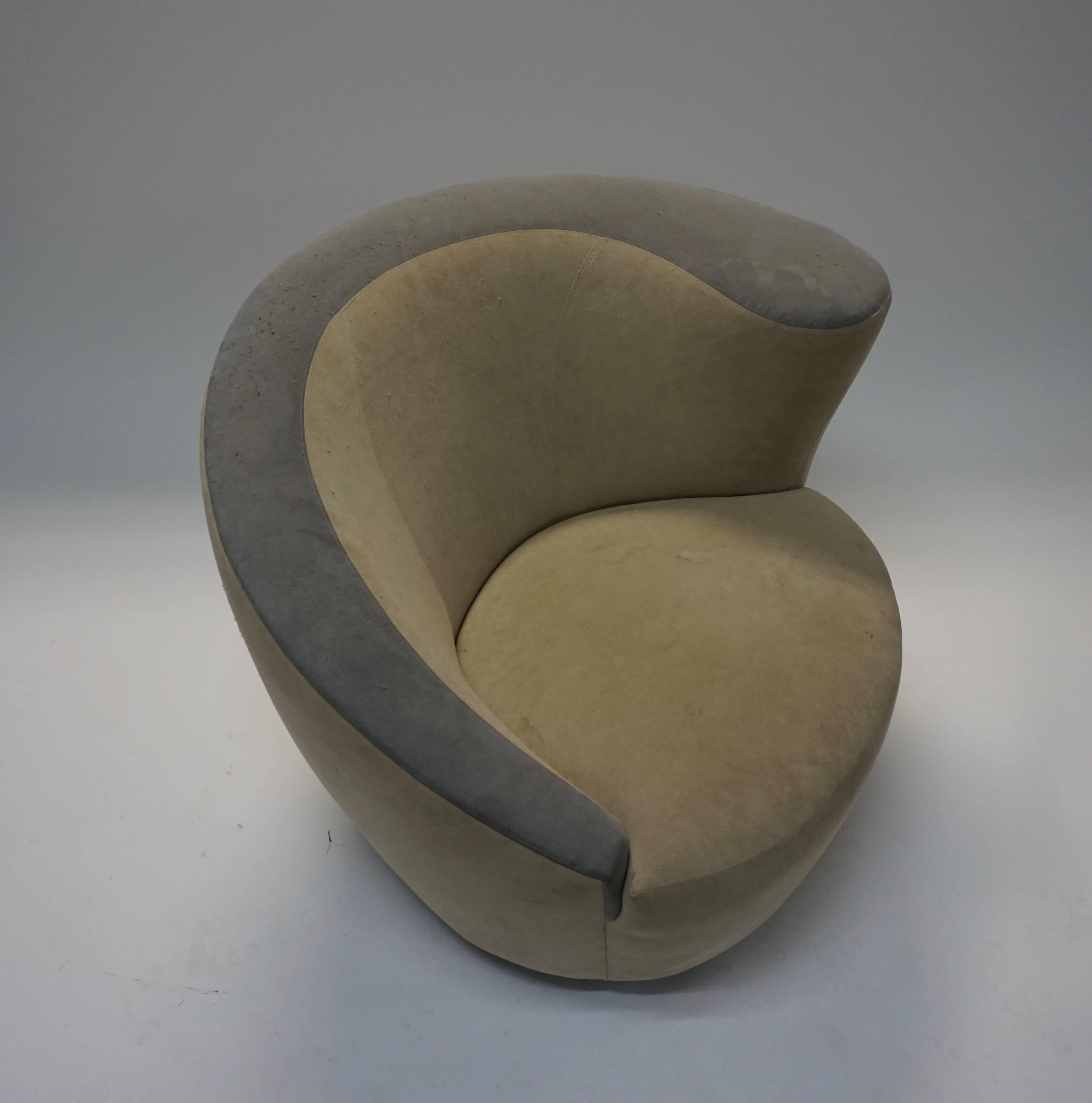 Pair of iconic Kagan design chairs from the Kagan Now collection, 1992. These are a right and a left chair set. Structurally sound. Foam is great and swivel bases work well. The current suede fabric needs to be replaced.