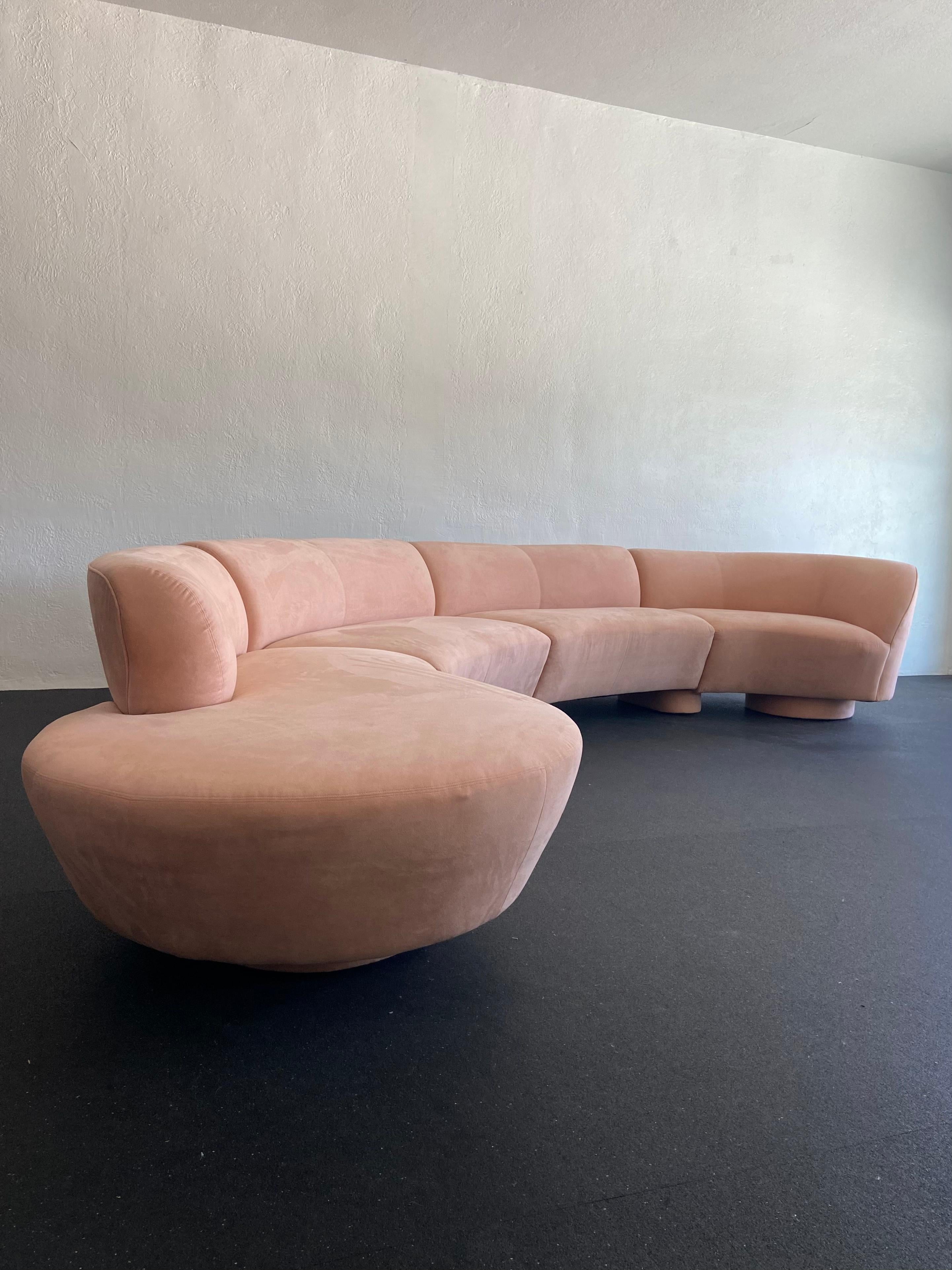 Rare 4-piece serpentine cloud sectional sofa by Vladimir Kagan for directional. Signed. Found in the original blush colored ultra suede upholstery. No rips or tears present. Current upholstery would be salvageable with a cleaning or reupholstery