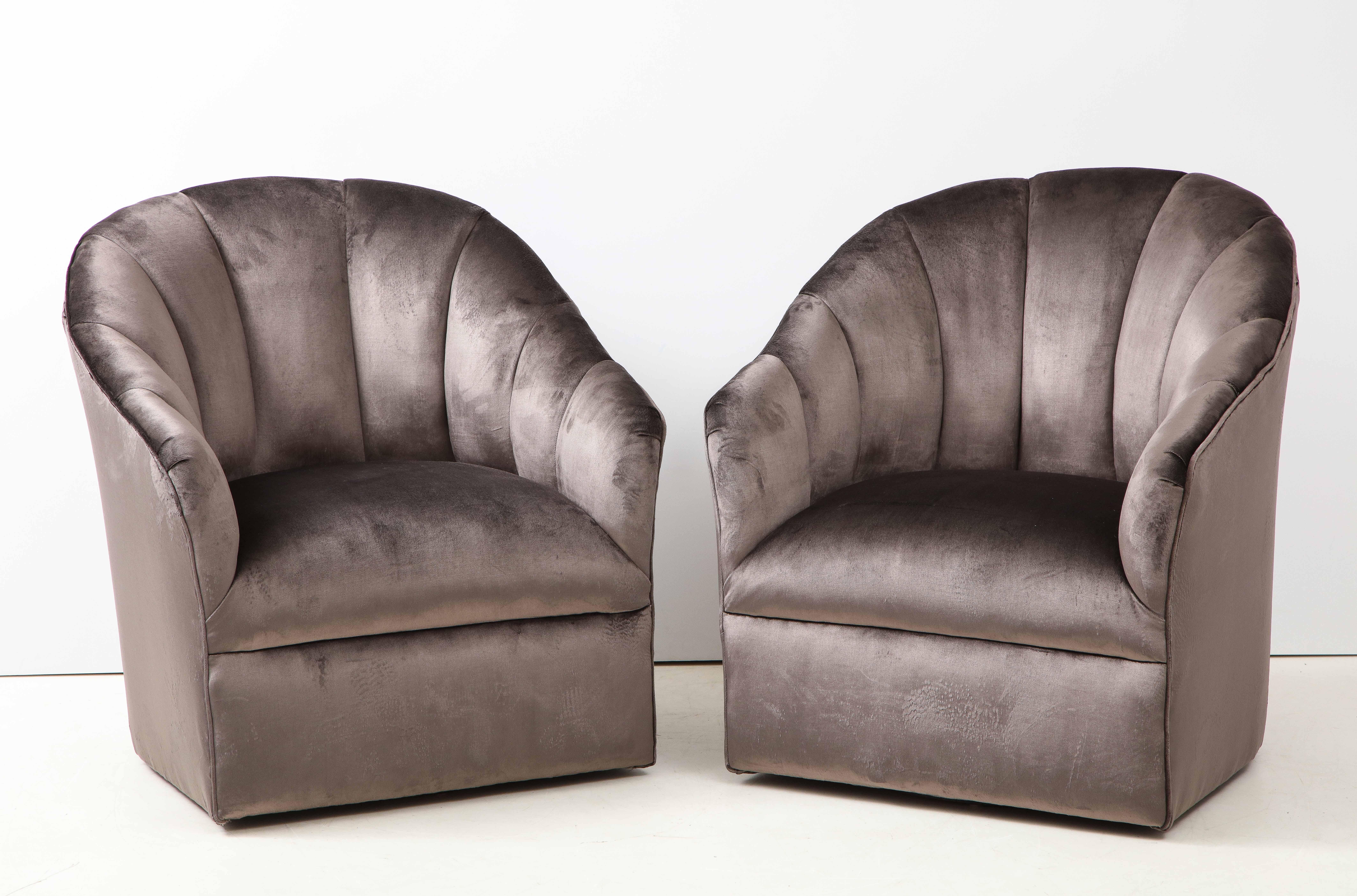 Stunning pair of 1980s swivel lounge chairs designed by Vladimir Kagan for directional, newly reupholstered in velvet.