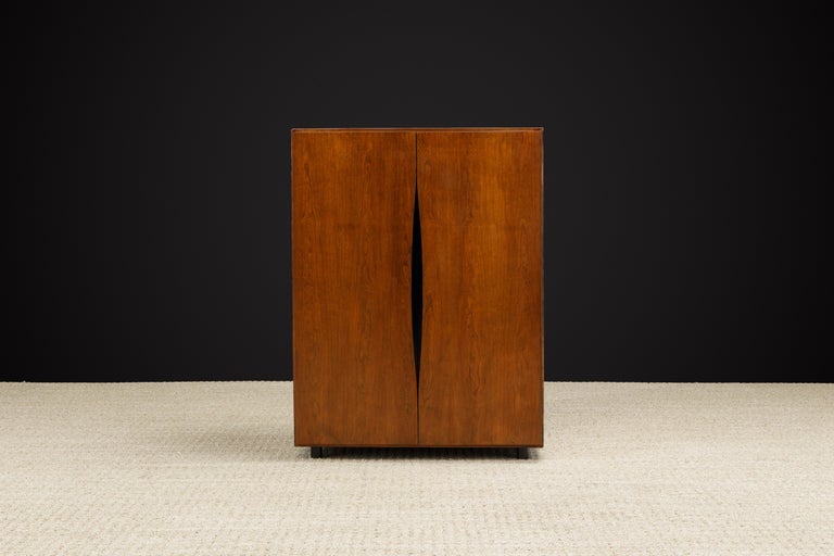 An incredible rare and highly sought after cabinet by Vladimir Kagan for Grosfeld House, from the 1950s. This fully restored accessory armoire is an excellent collectors example as it is in pristine condition which started as an item that was