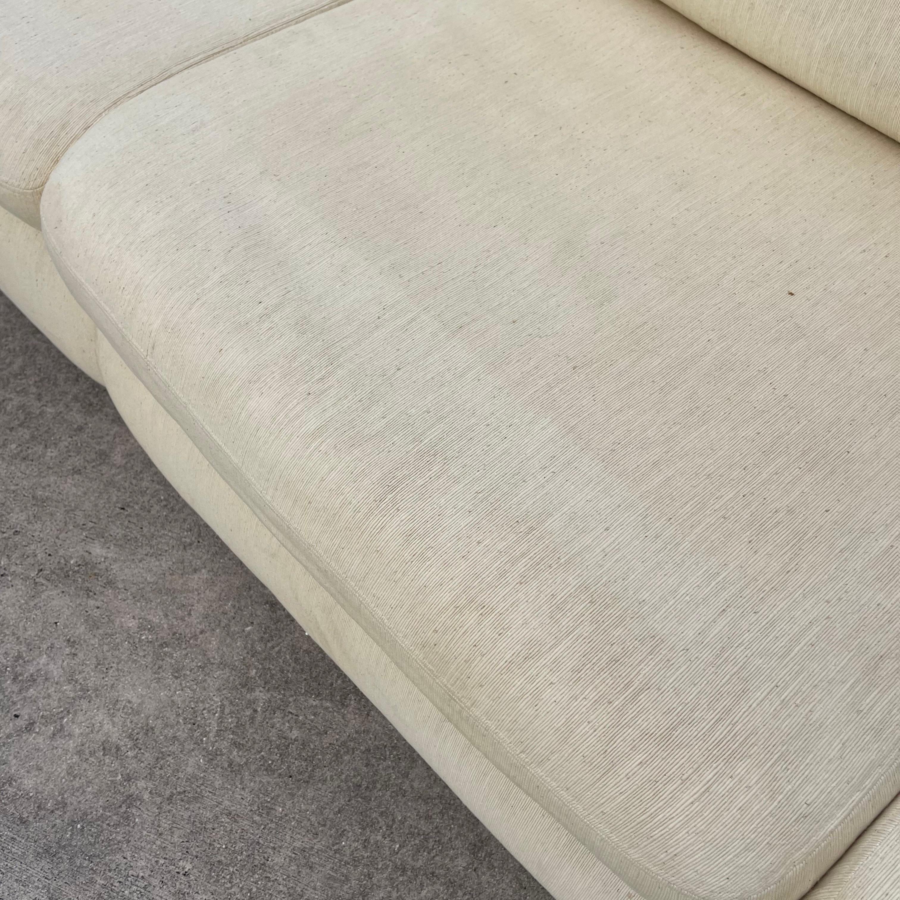 Fabulous vintage sofa designed by Vladimir Kagan for Preview furniture. Upholstered in Haitian Cotton, all original. Modular design allows for use as large sofa, 3-seat sofa with single slipper chair, or loveseat with a pair of slipper chairs.