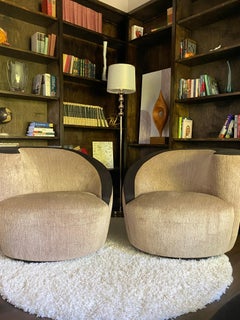 Weiman "Nautilus" Swivel Chairs, a Pair