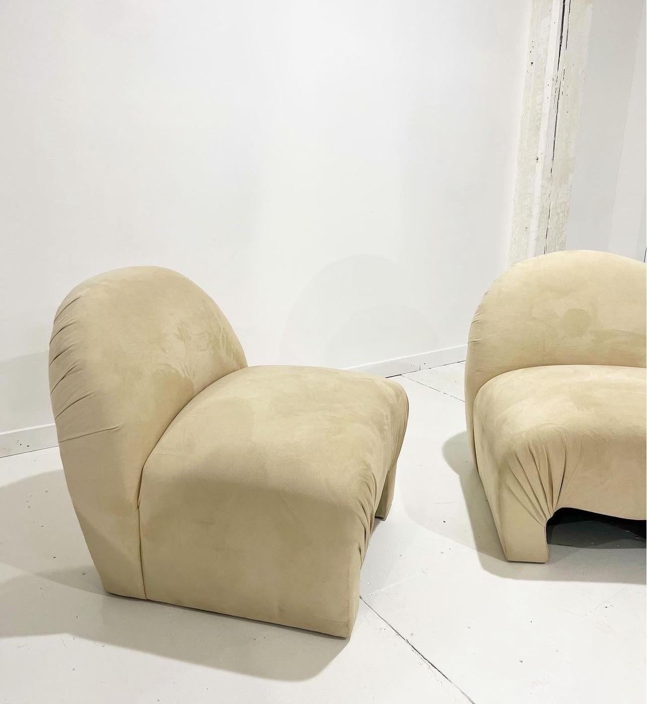 Absolutely stunning pair of sculptural lounge chairs for Weiman

The perfect low-level living sitting chairs. Love the curvaceous, whimsical and organic shapes of these chairs! These chairs are extremely comfortable and cozy. Upholstered in a bright
