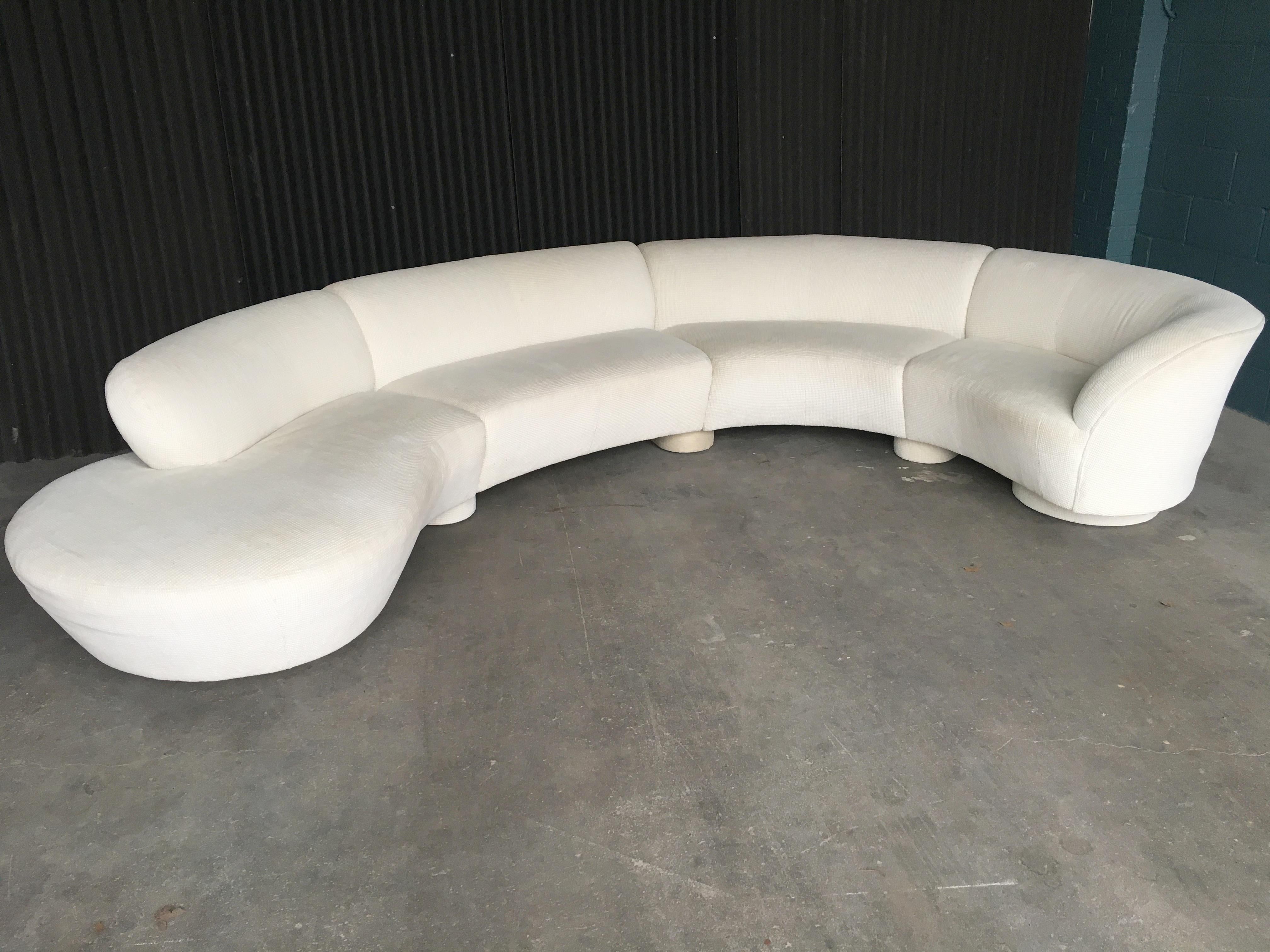 Exceptional serpentine sectional by Vladimir Kagan for Directional. All four pieces are tagged with the Directional Label.
Nubby fabric is in very good to excellent condition with no rips, stains or tears anywhere.
Just had the entire sectional