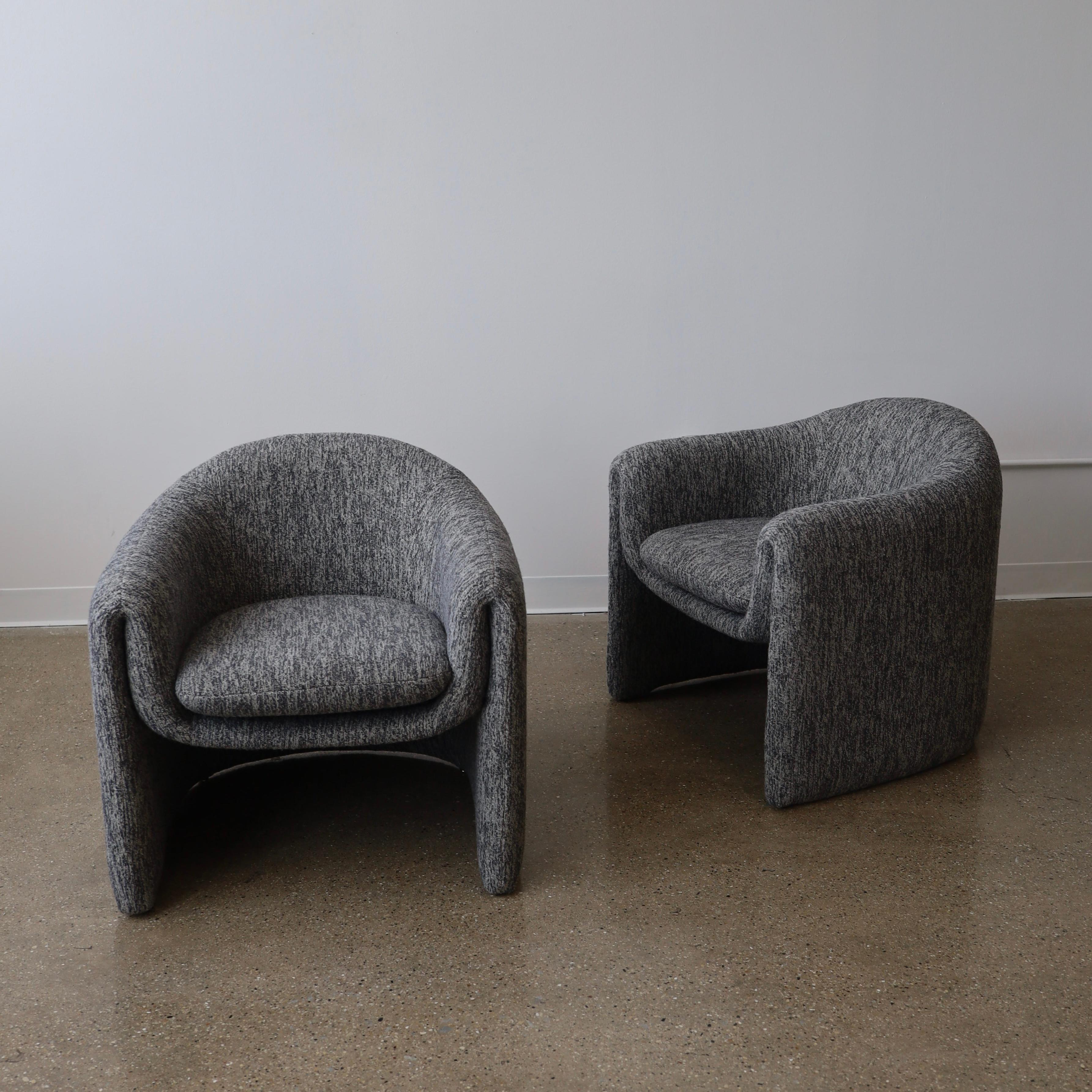 c. 1980s for Preview, freshly reupholstered in woven wool / cotton blend fabric. These chairs are in excellent, restored condition and feature their original tags